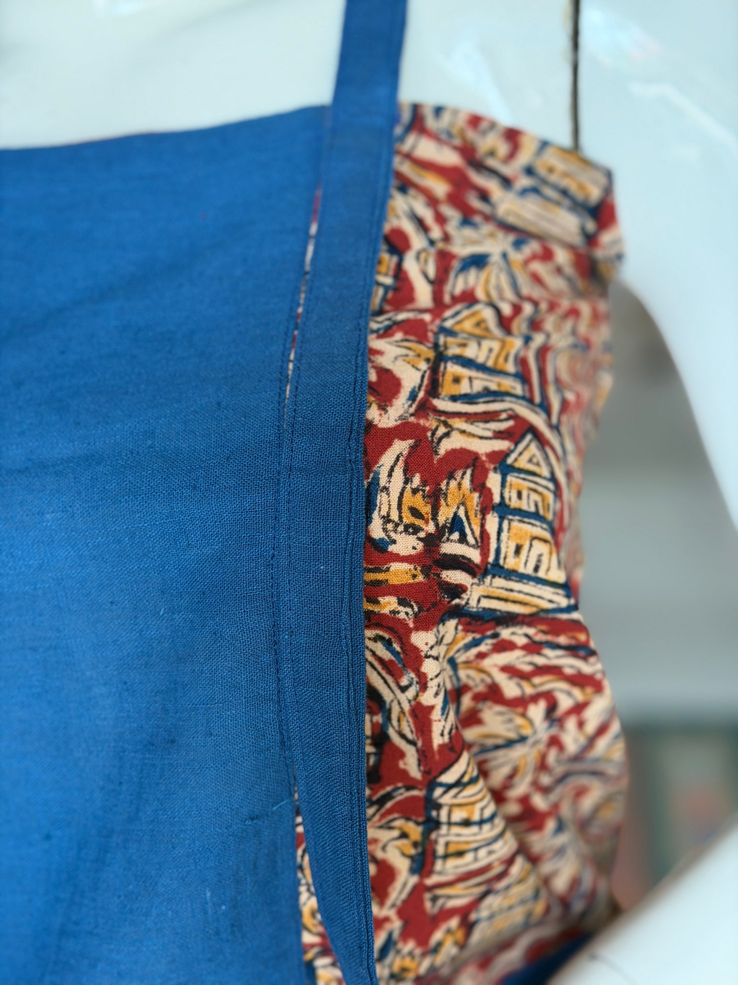 Kalamkari meets Kala cotton - plain blue handloom center panel crop top with hand block printed sides and long straps