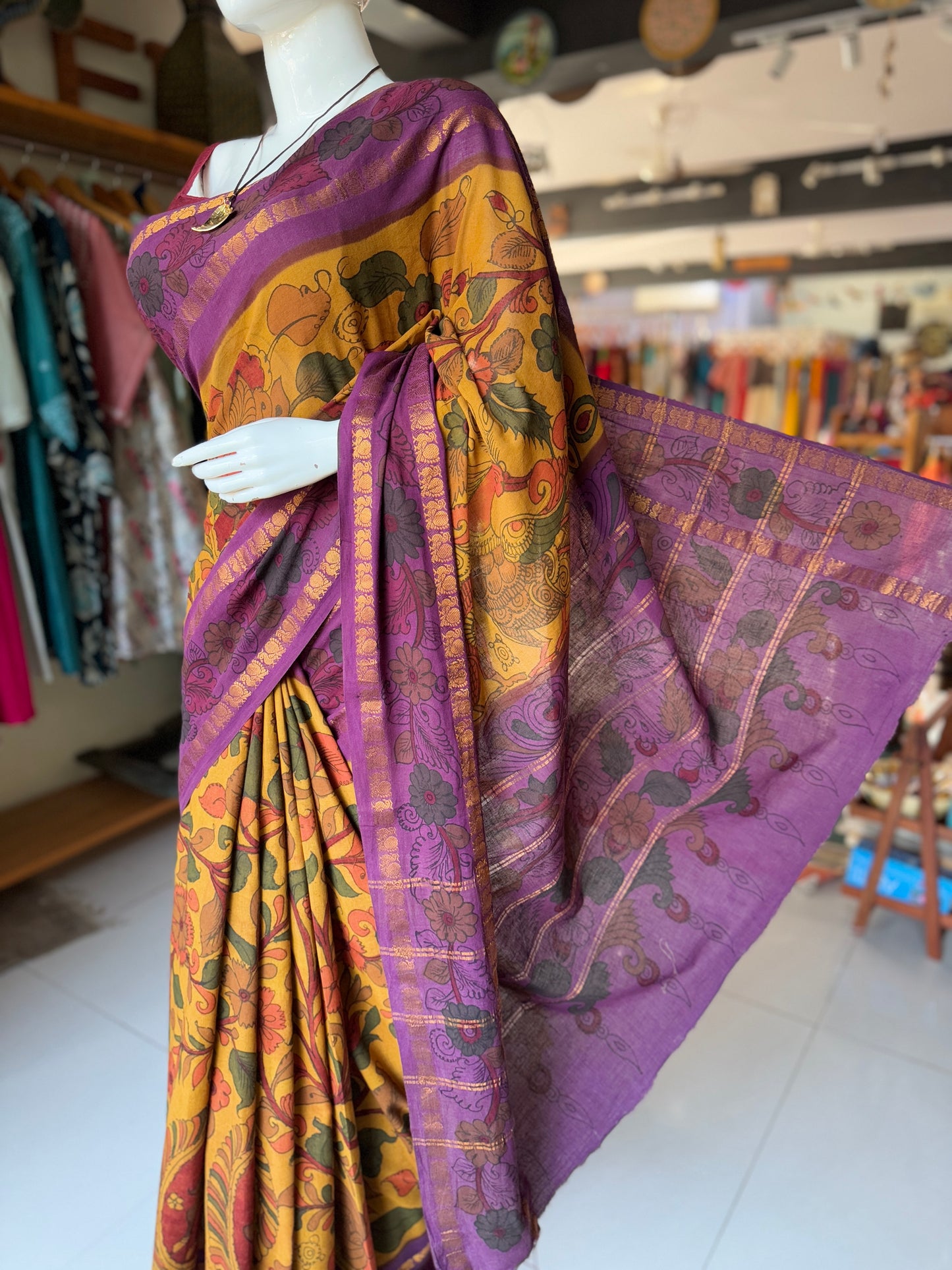 Mustard and purple floral design hand painted pen Kalamkari cotton saree