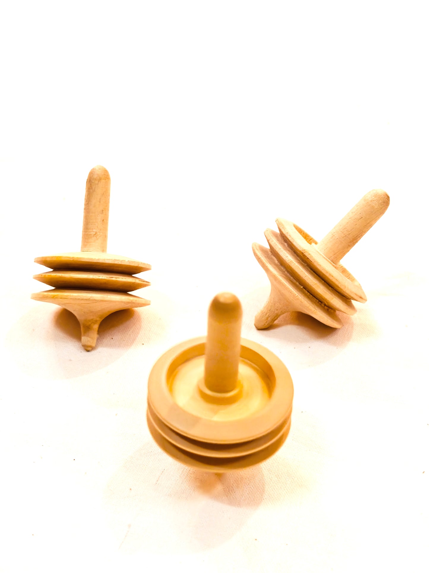 Natural wooden handmade spin top / bongaram