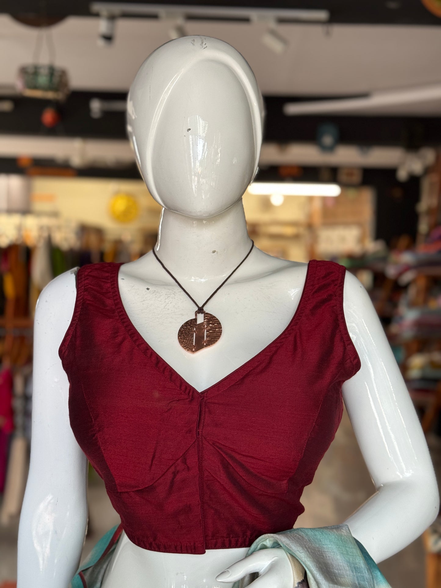 Handcrafted copper pendant with brown thread neck piece