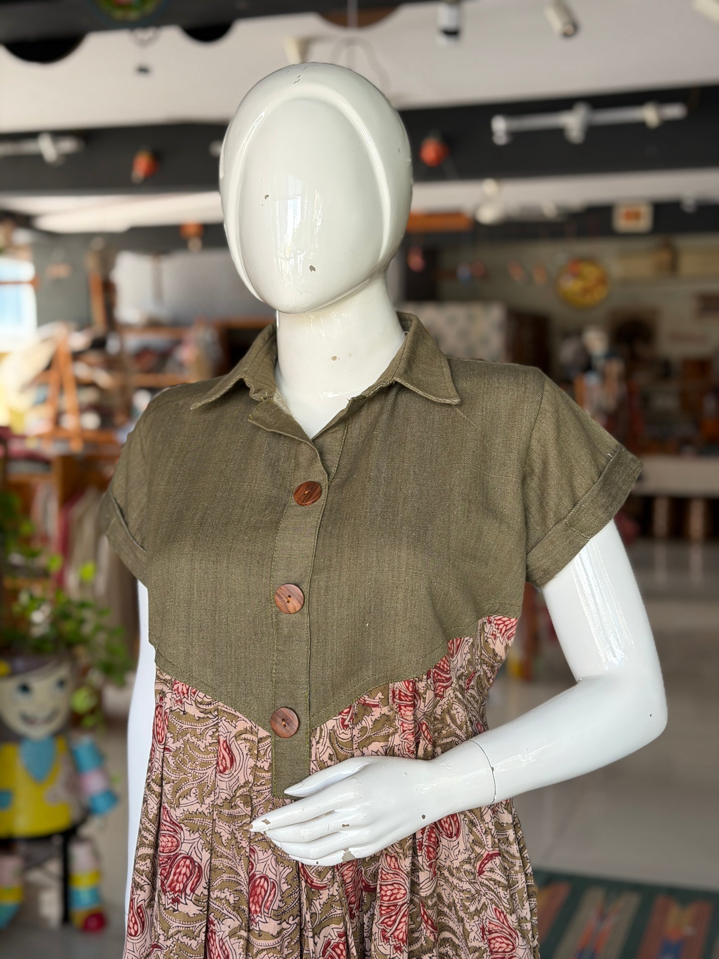 Green denim weave cotton hand woven playful shirt look dress with Kalamkari hand block printed attached skirt with pockets