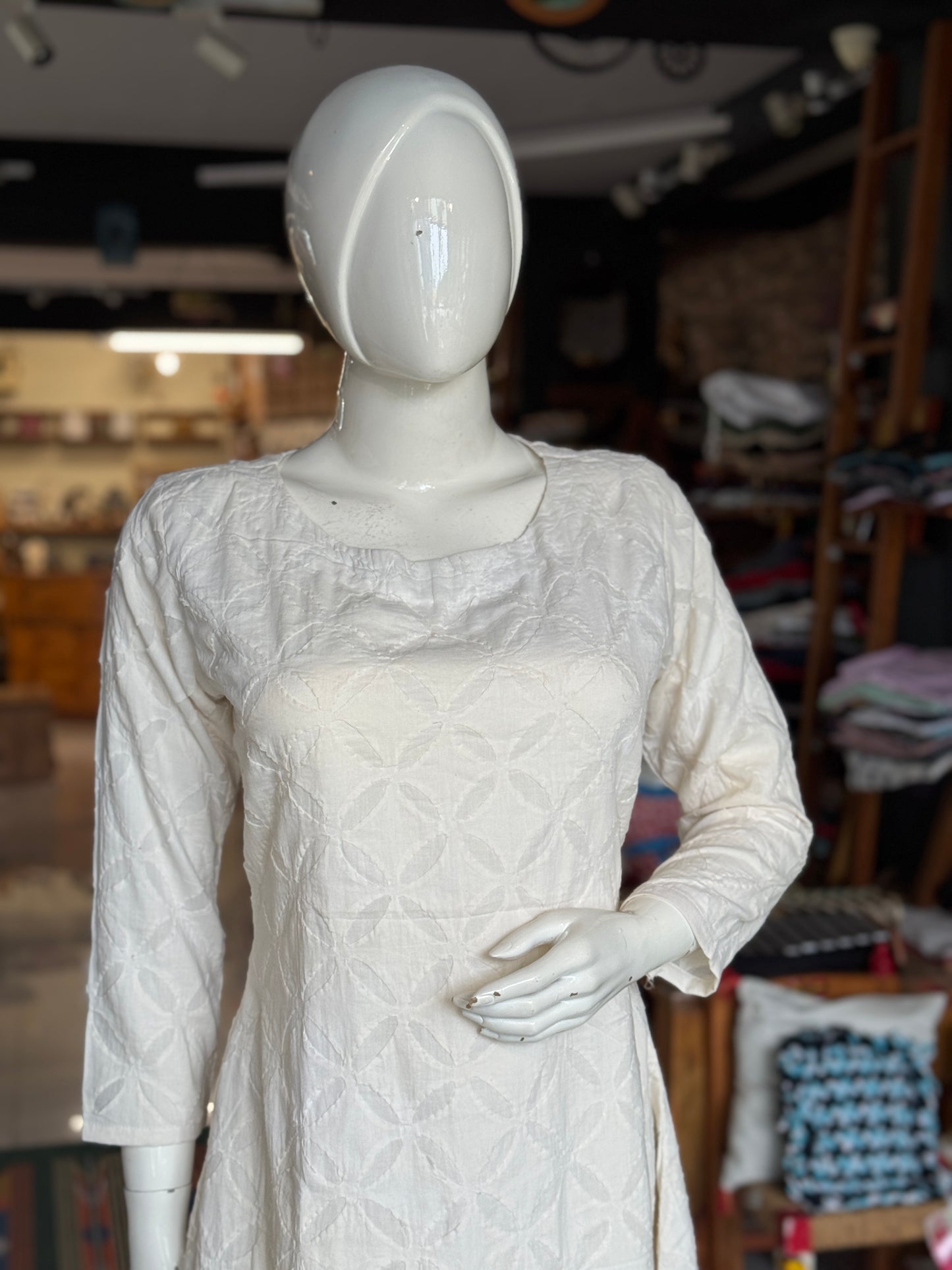 Off White appliq hand crafted cotton A-line kurti