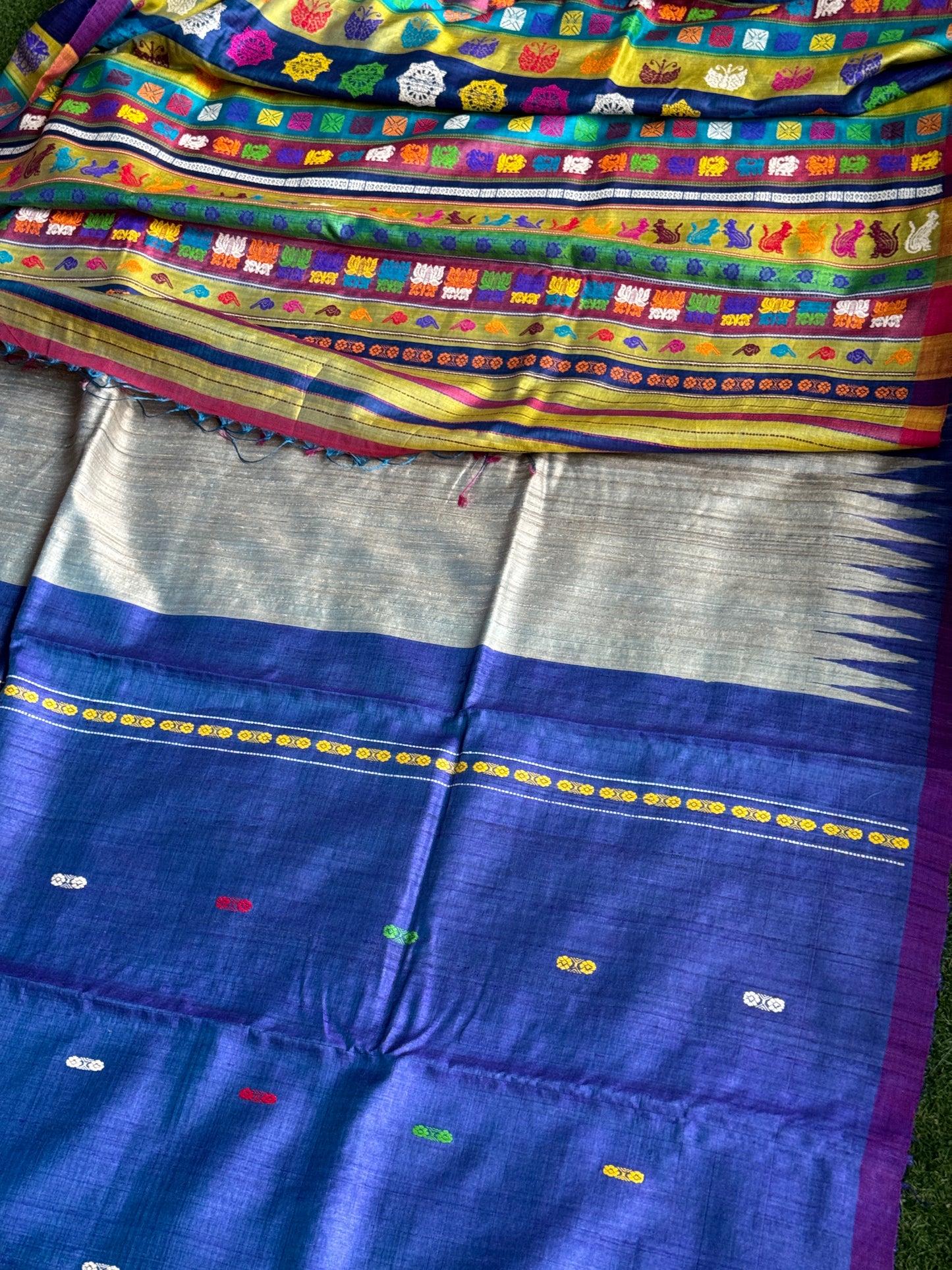 Silver blue tone pure tussar silk handwoven saree with extra weft flower butis and colorful jala palla