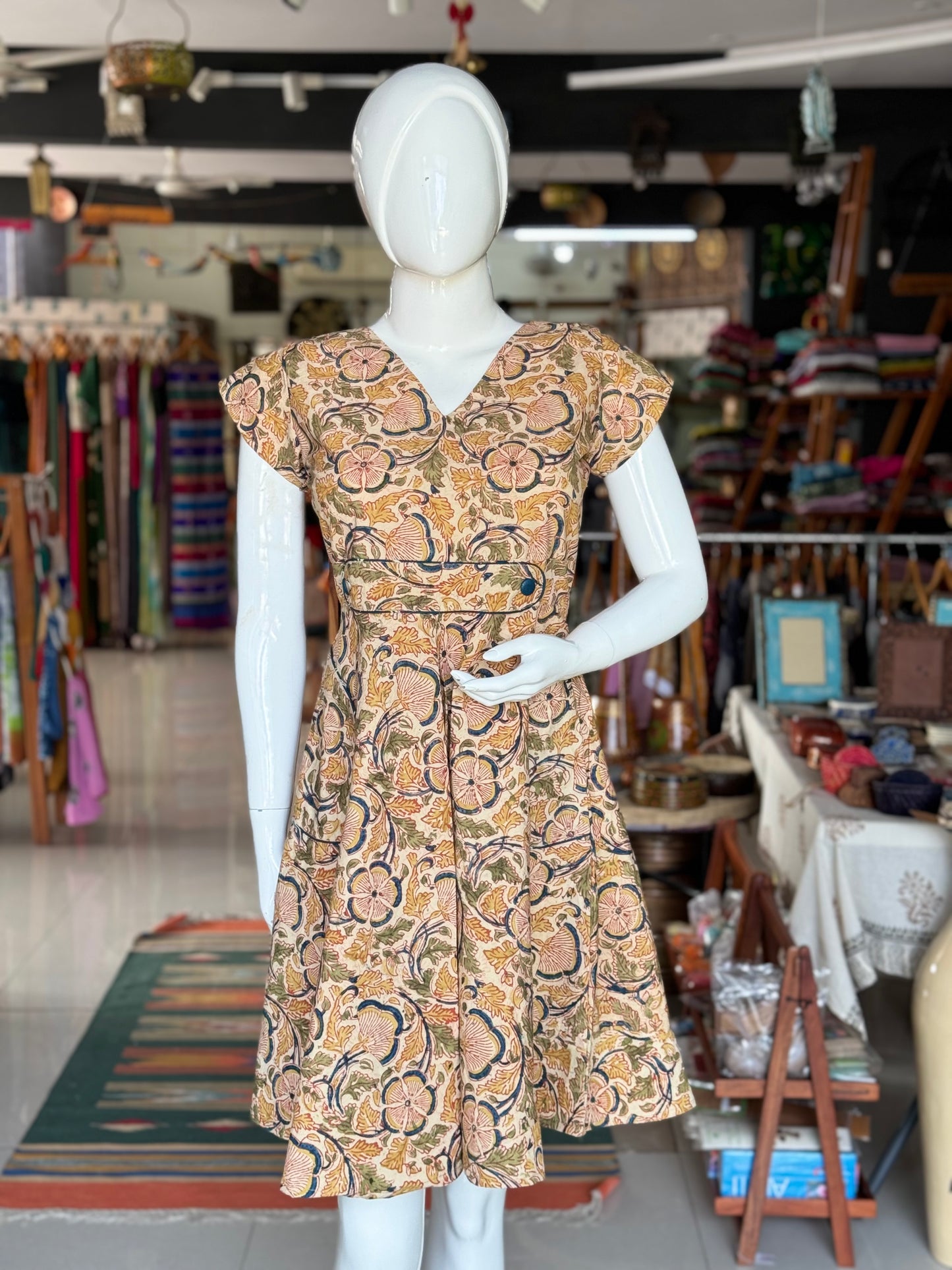 Beige floral hand block printed Kalamkari cotton dress with pocket detailing