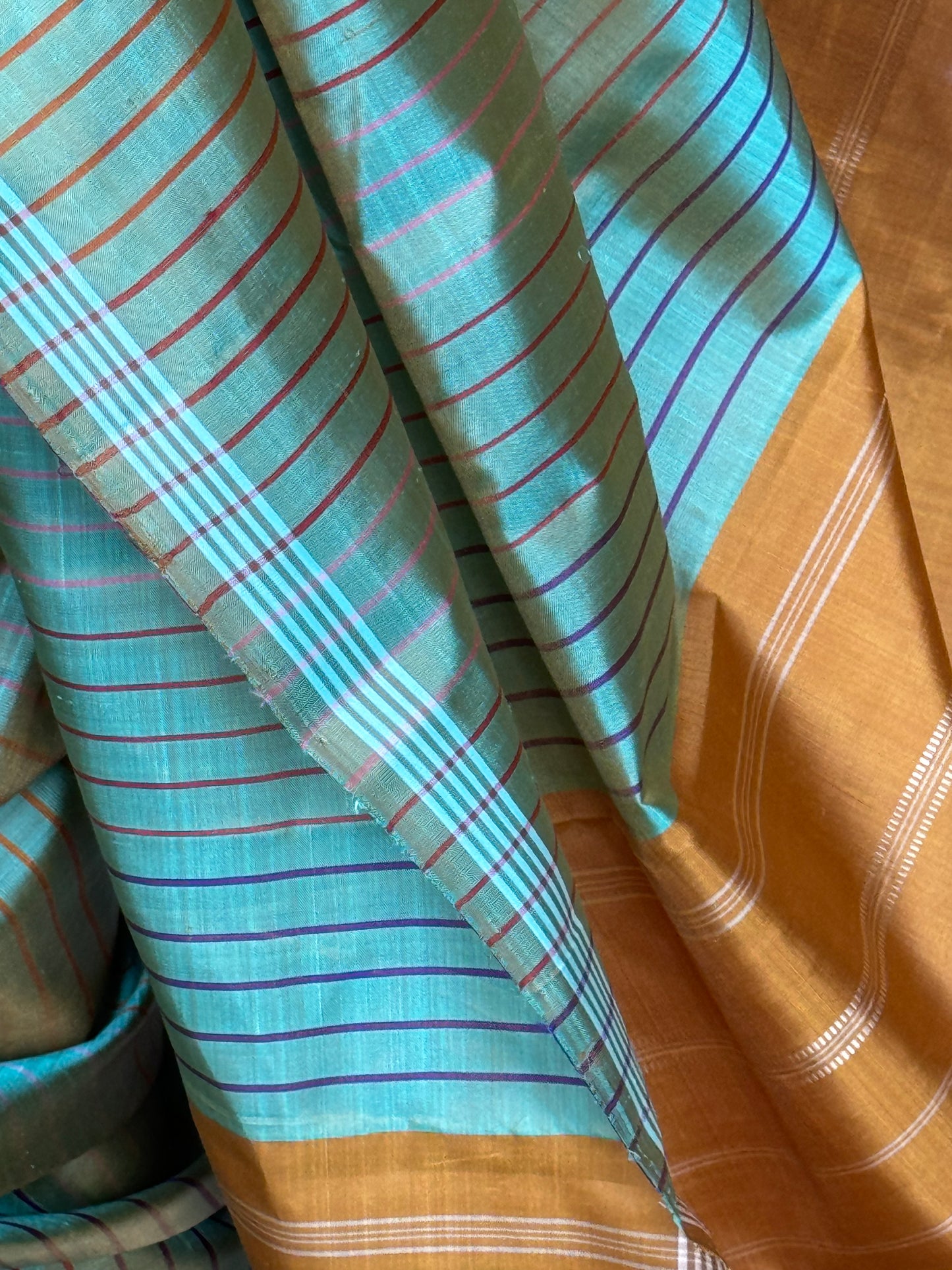 Green pure silk handloom kanjeevaram pattu saree with multi colored stripes all over