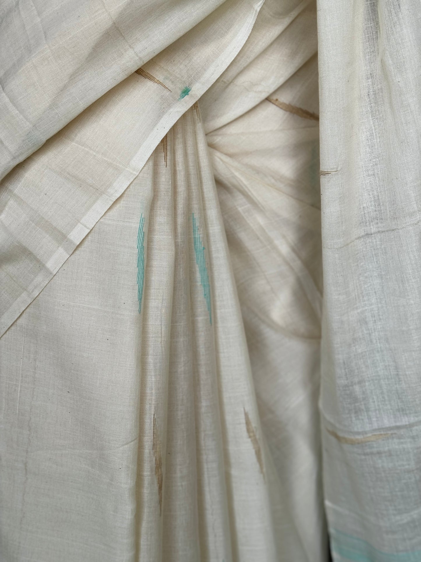 Offwhite pure soft cotton handloom saree with sea green and beige accents