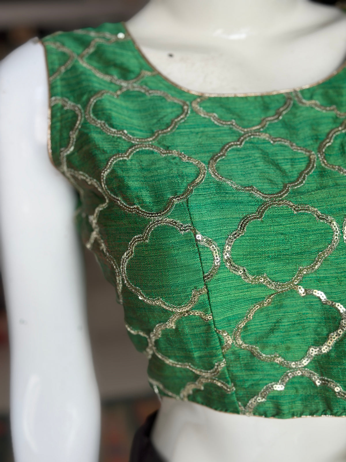 Green sleeveless raw silk blouse with sequin embroidery- back open