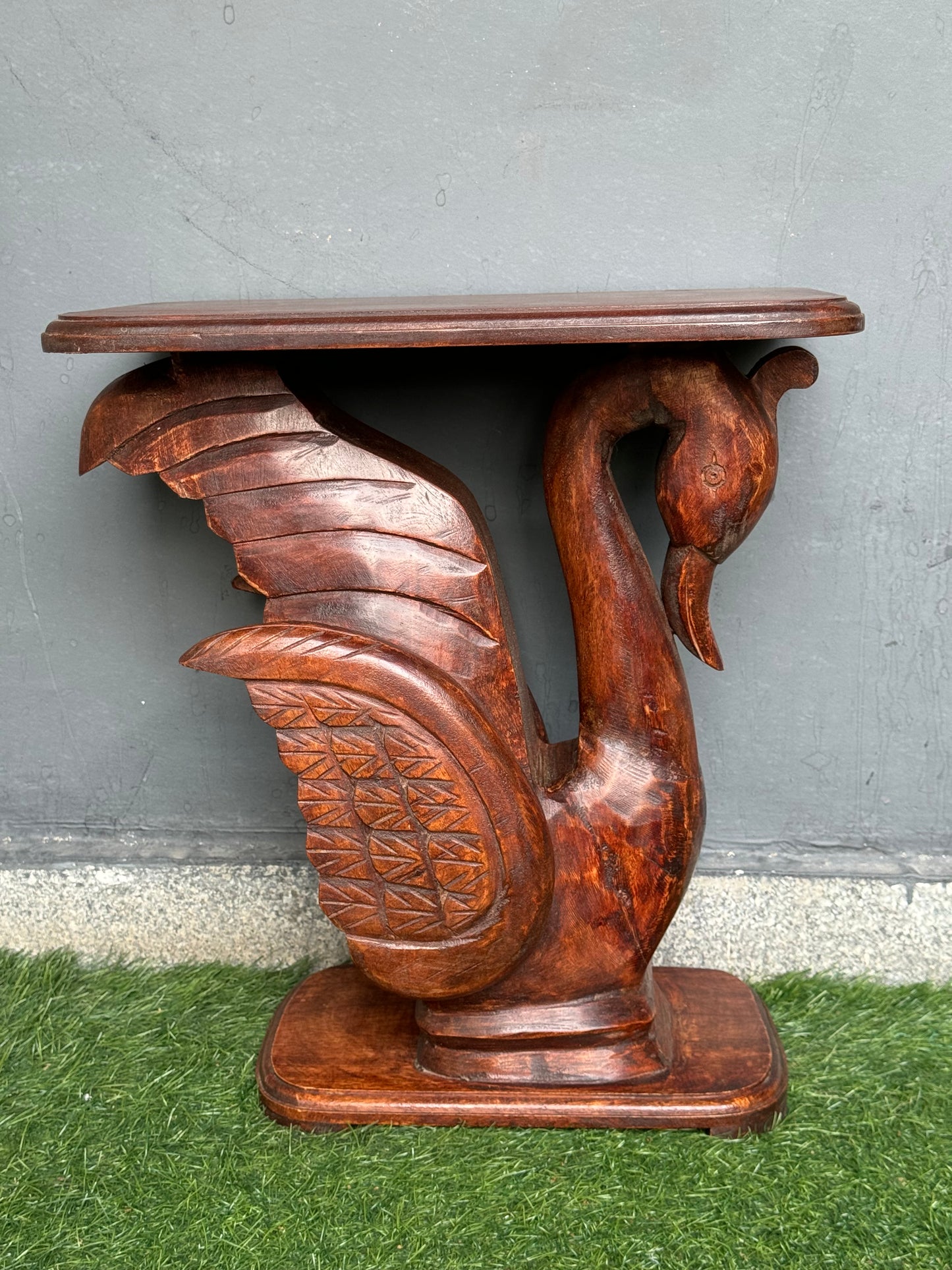 Wooden side / center table with carved swan base and flat top