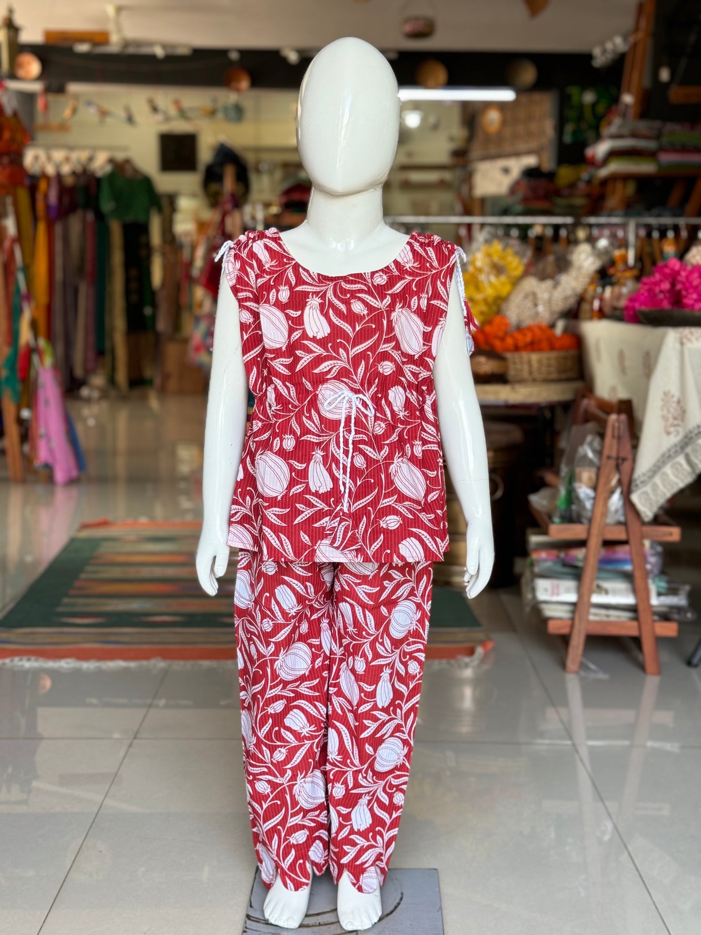 Red floral kaftan style cotton top with shoulder and waist draw strings plus straight pants with scallop hem set for girls