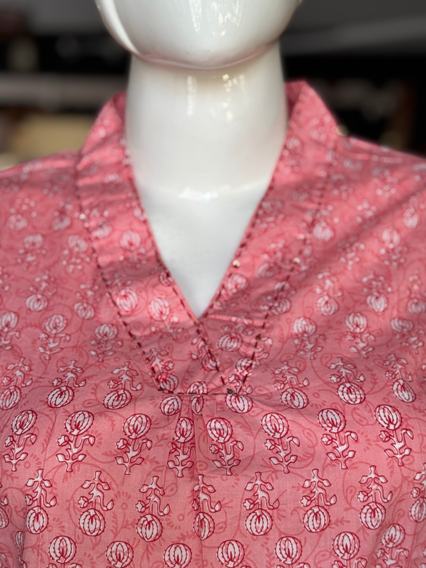 Cotton floral print short top with handwork detailing around neck