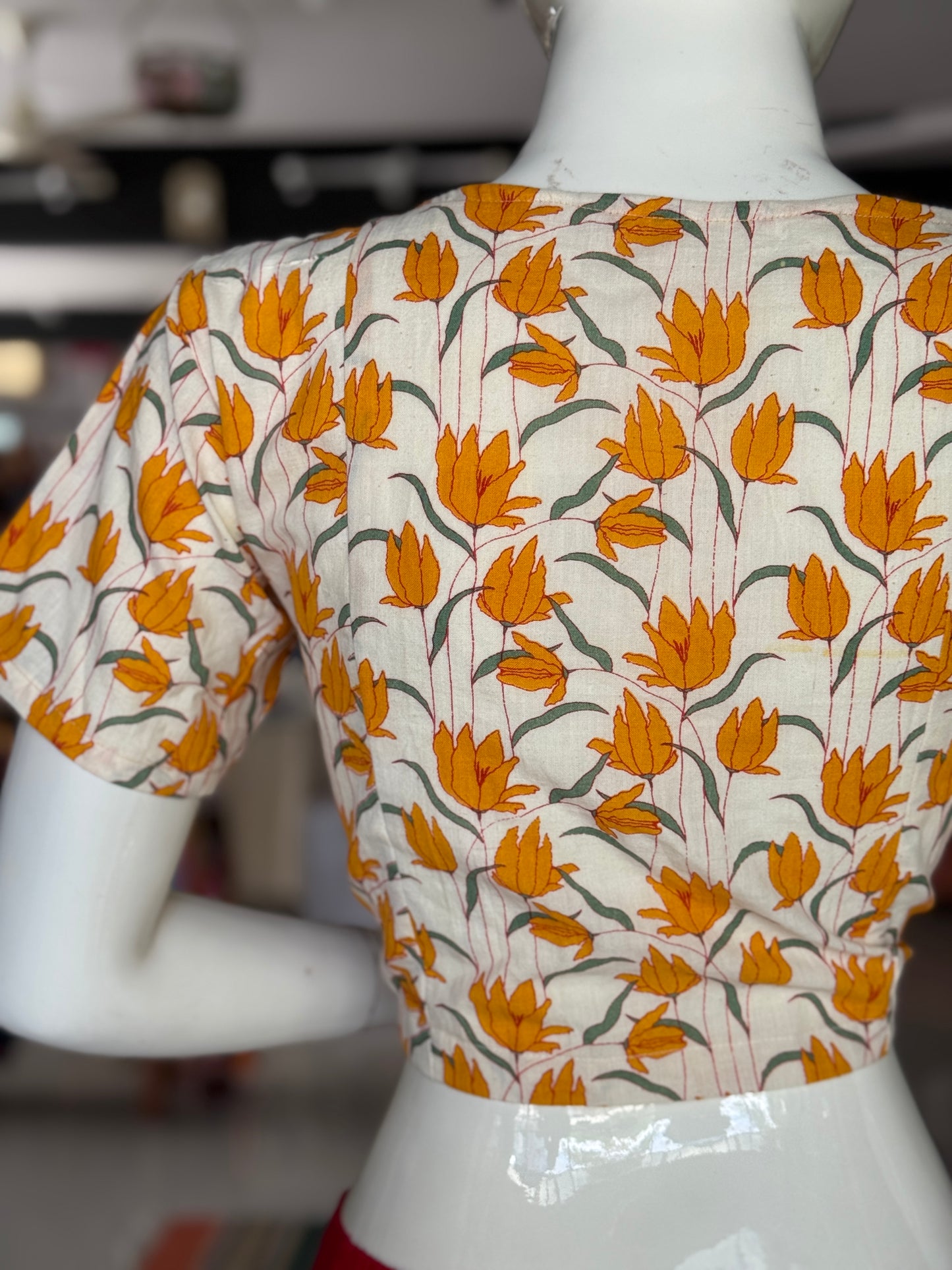 Offwhite handwoven cotton front open blouse with mustard yellow flowers