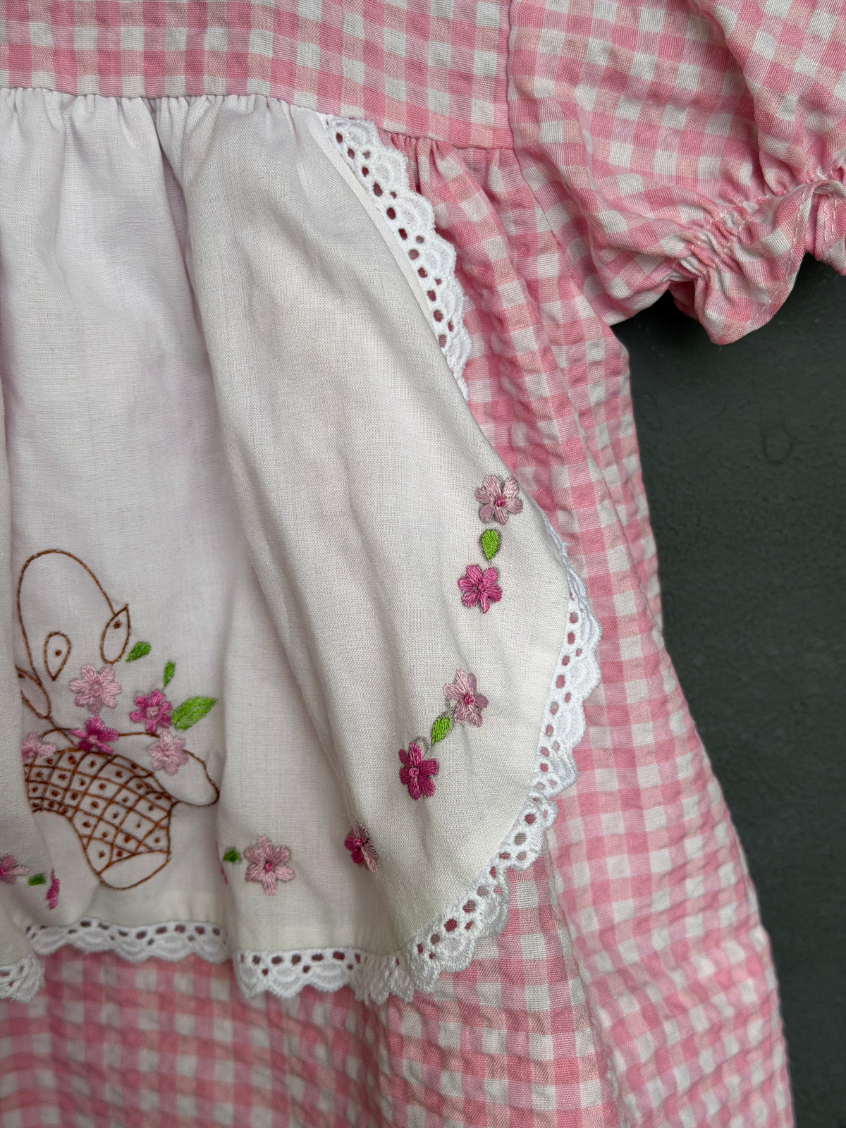 Pastel pink cotton frock for girls with white embroidered front flap