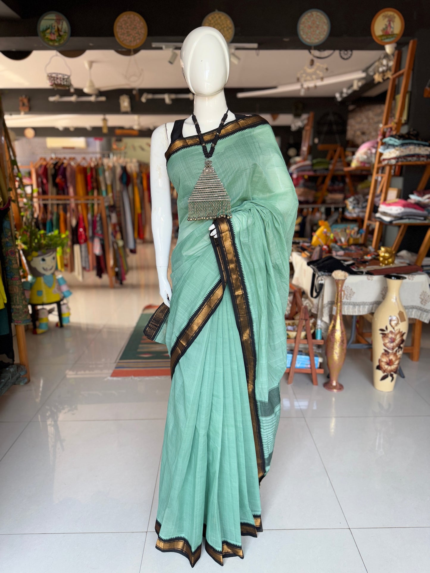 Sea green handloom cotton saree with black Kuppadam zari border