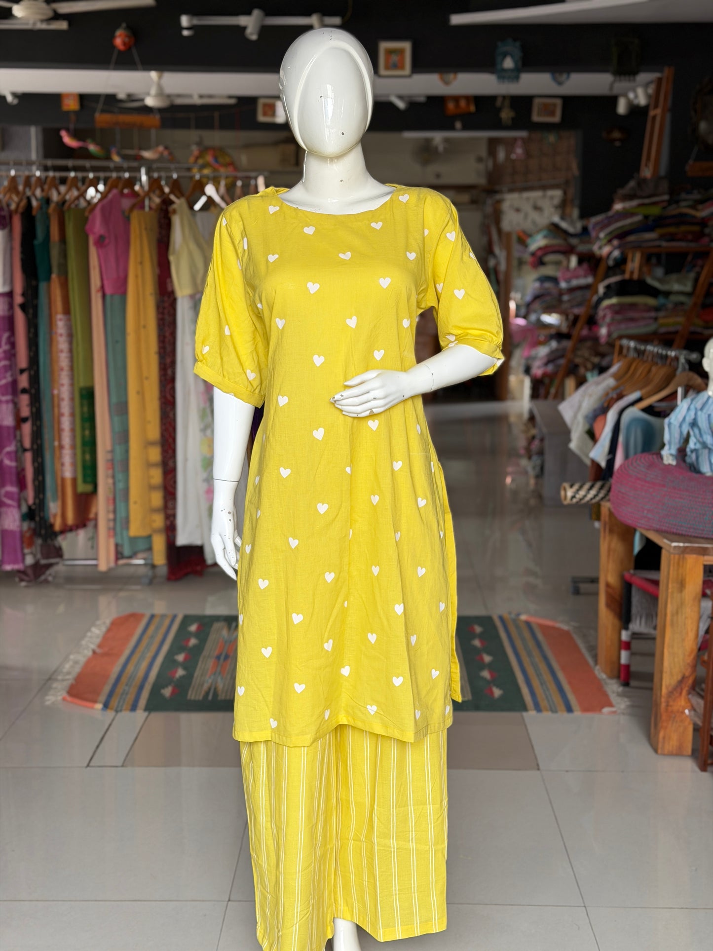 Yellow hearts print cotton kurti paired with a matching stripes print barrel pants - 2 piece set