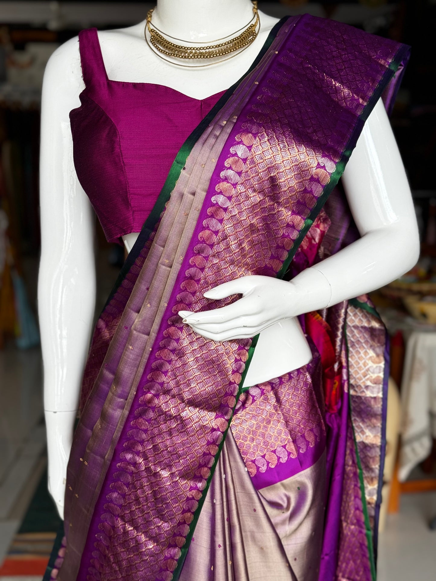 Purple and gold dual tone pure silk twill weave handwoven Gadwal saree with green selvedge