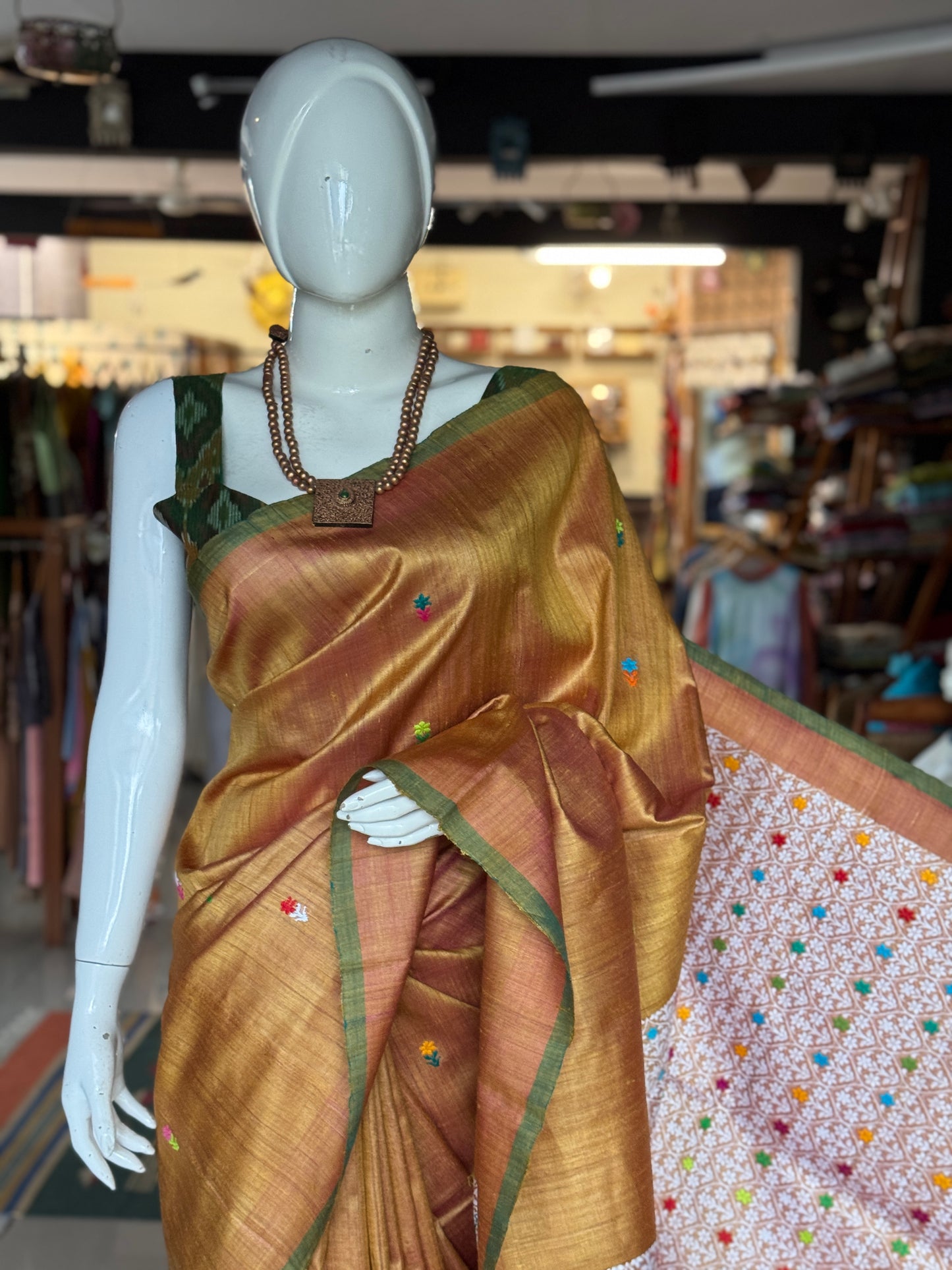 Golden tone pure tussar silk handwoven saree with extra weft flower butis and jala palla