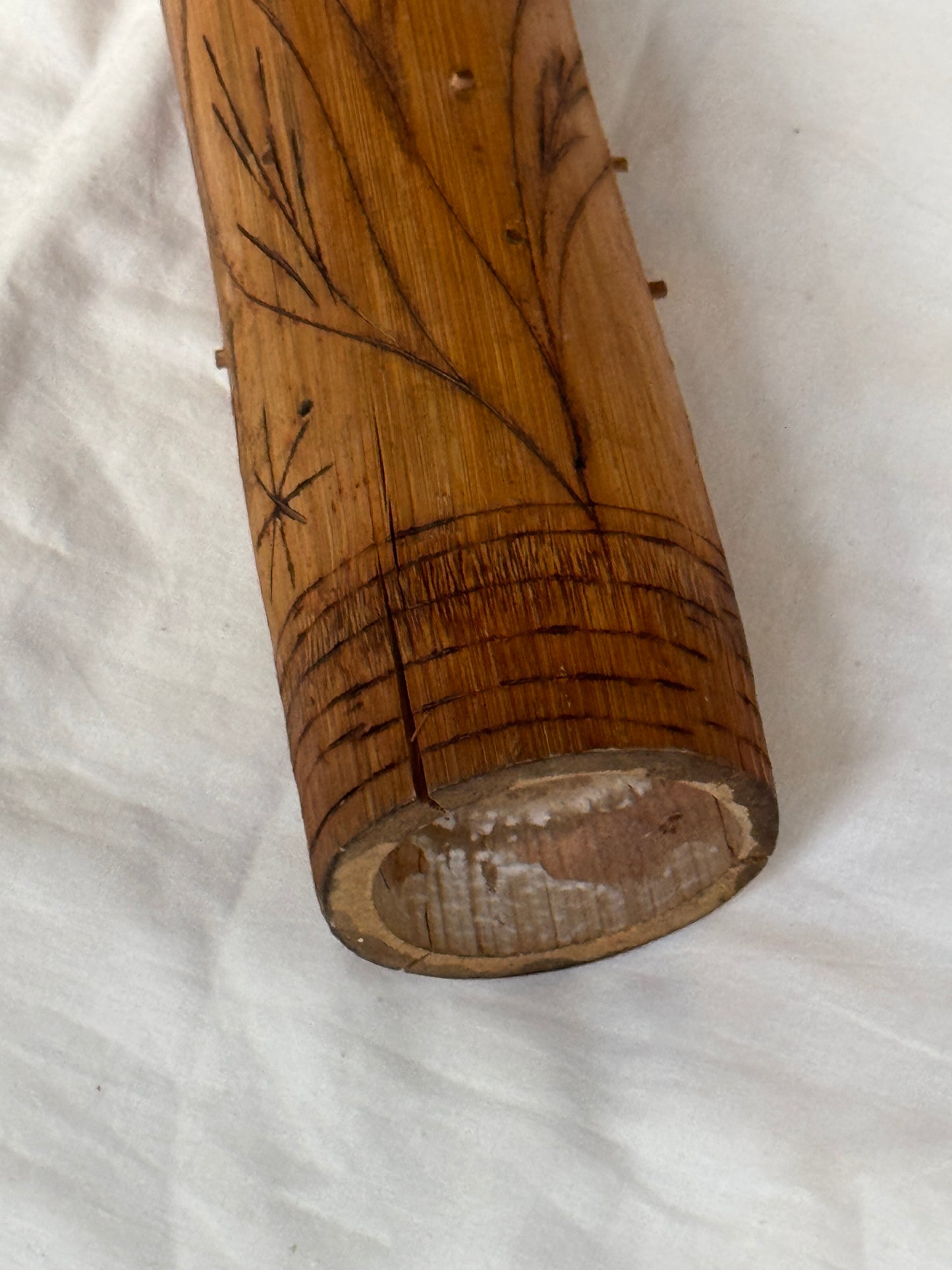 Rain maker in bamboo with leaves design on top