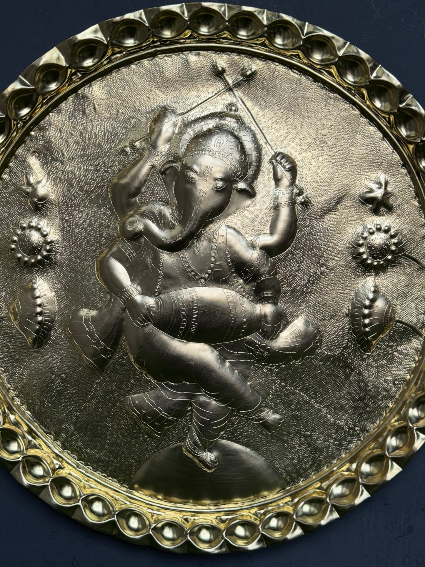 Ganesha in dancing pose - Brass handcrafted round wall plate - traditional embossed Chamba thaal