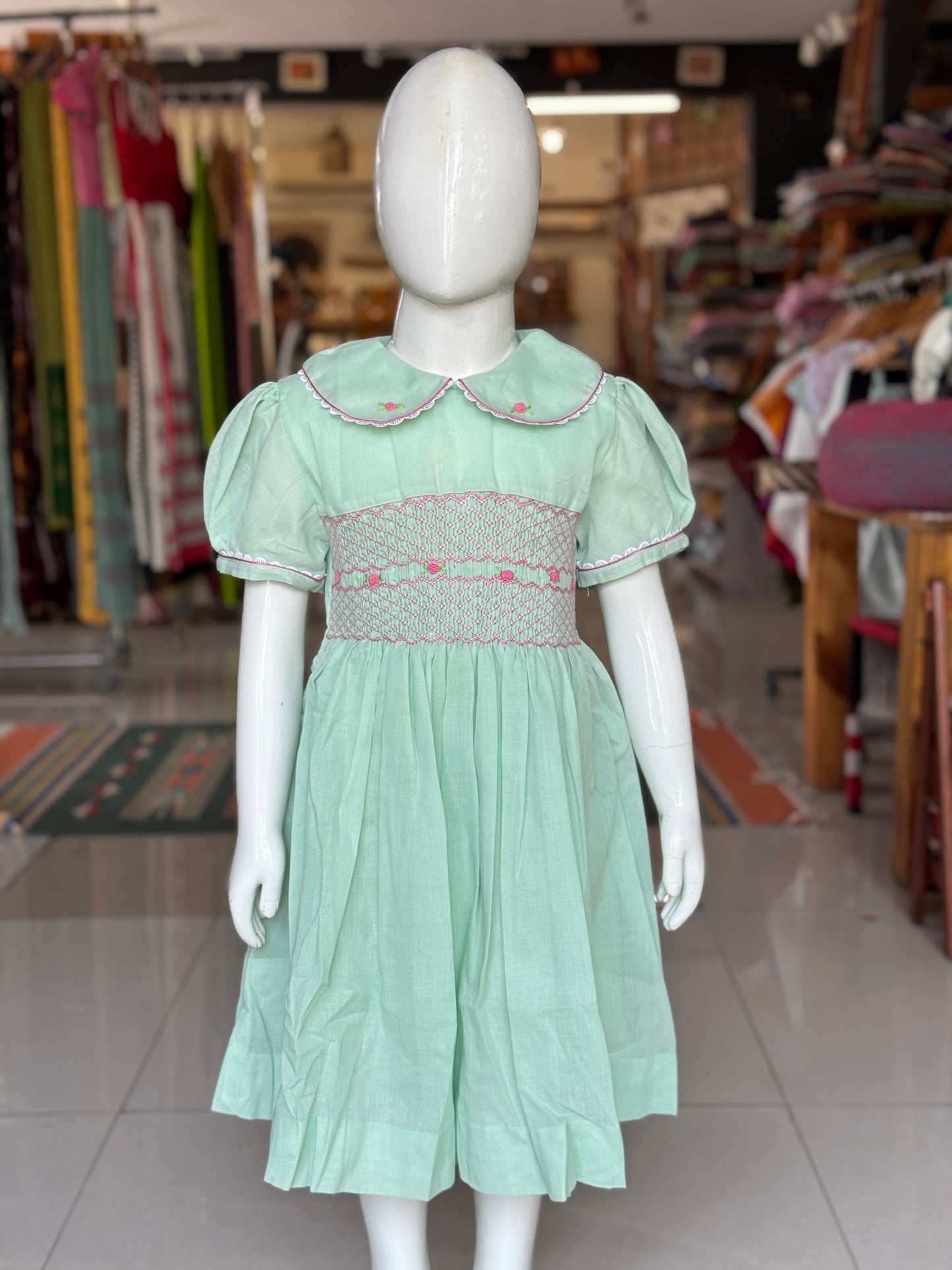 Pista green hand embroidered smocking cotton frock for girls with collar and lace trims