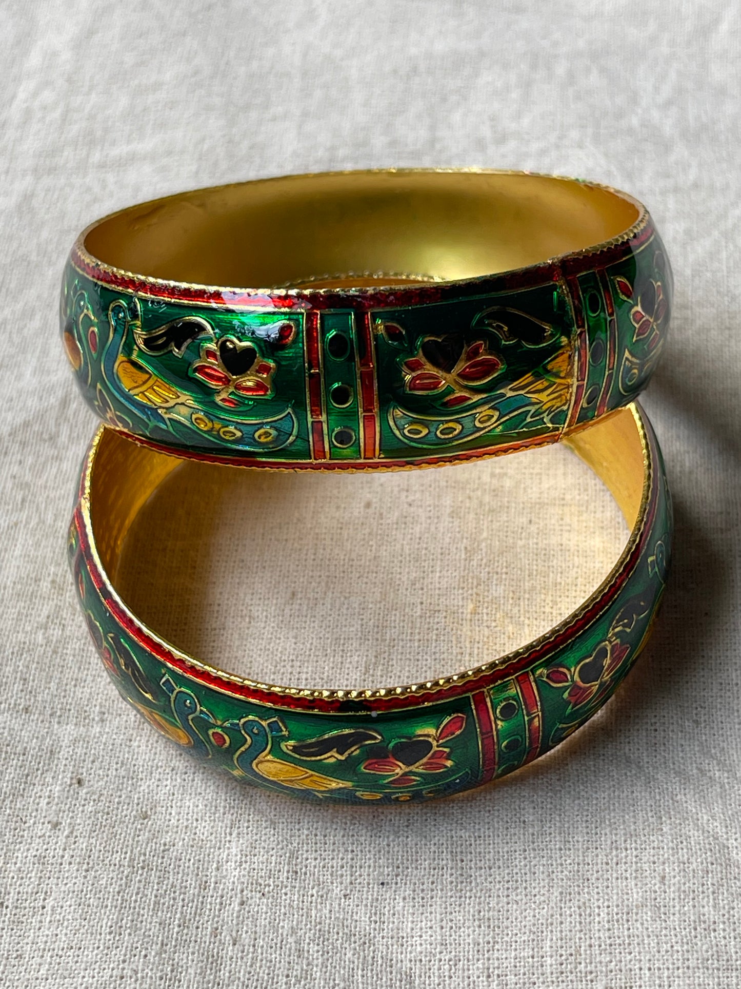 Lacquer enamel bangles pair with peacock motifs