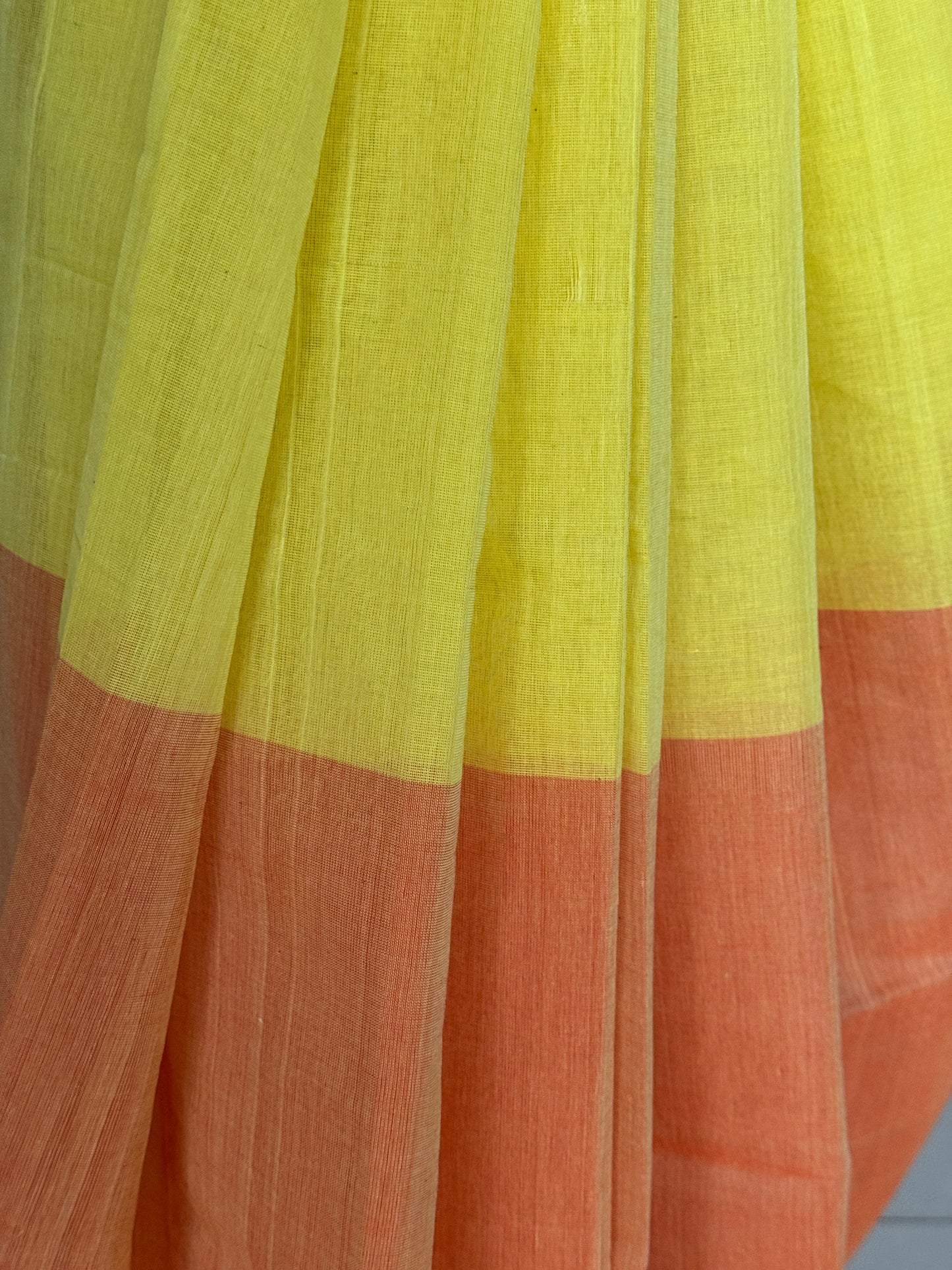 Yellow orange vertical split handloom cotton saree
