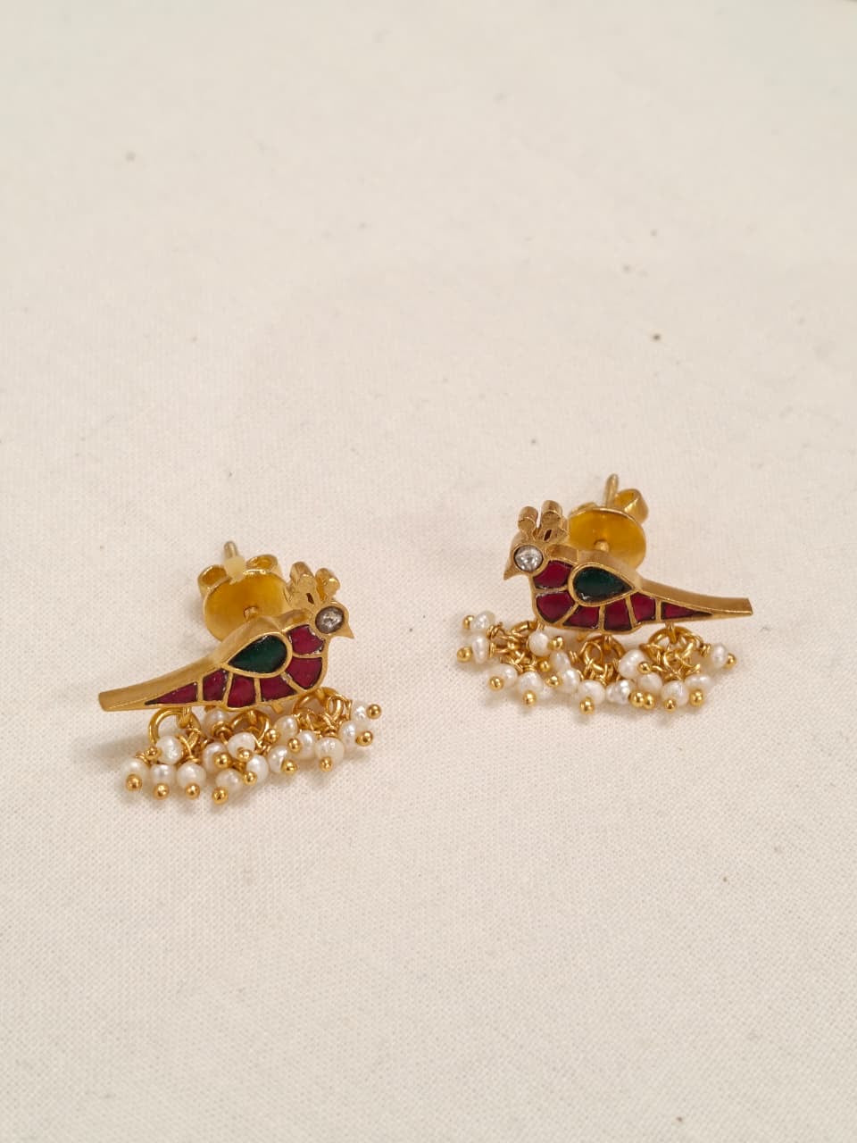 Birds silver ear studs in Pink and green stones with pearl drops