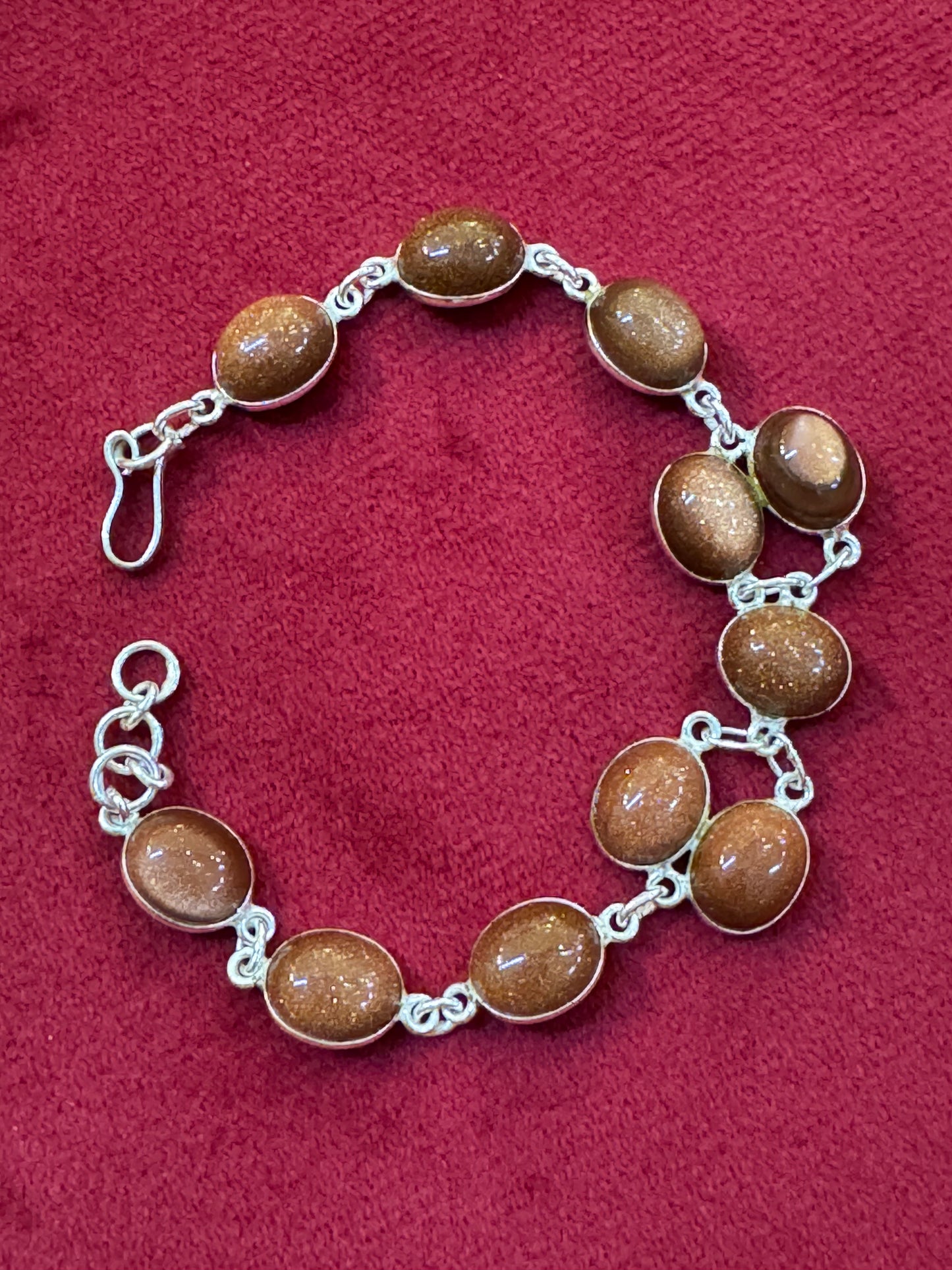 Brown shimmer semi precious stones studded pure silver bracelet