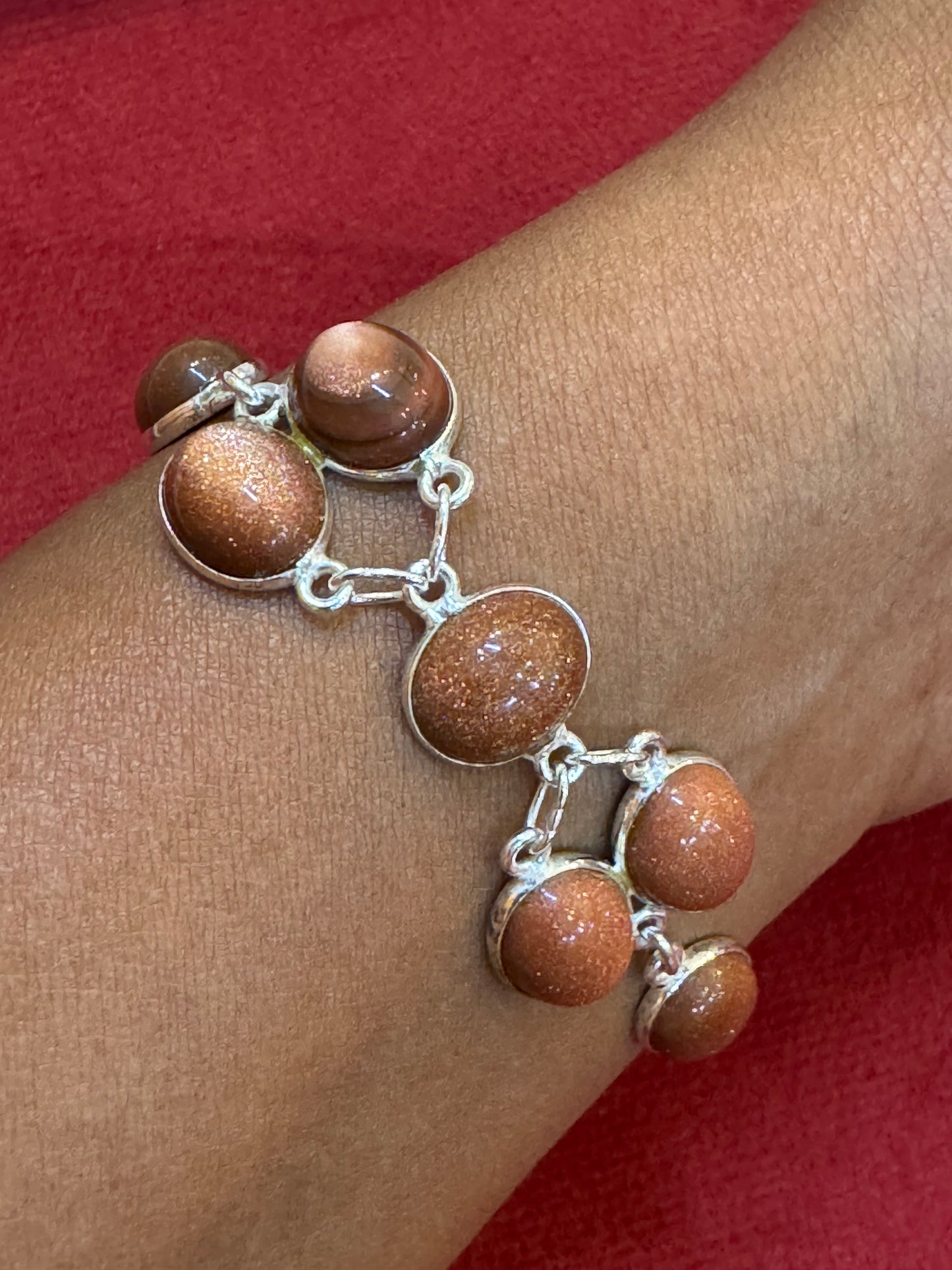 Brown shimmer semi precious stones studded pure silver bracelet