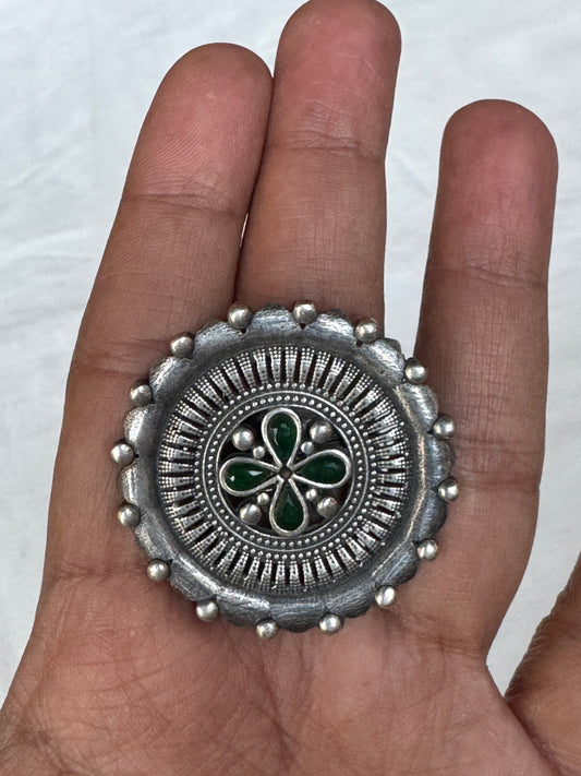 Green stones in the center - oversized brass finger ring with silver finish