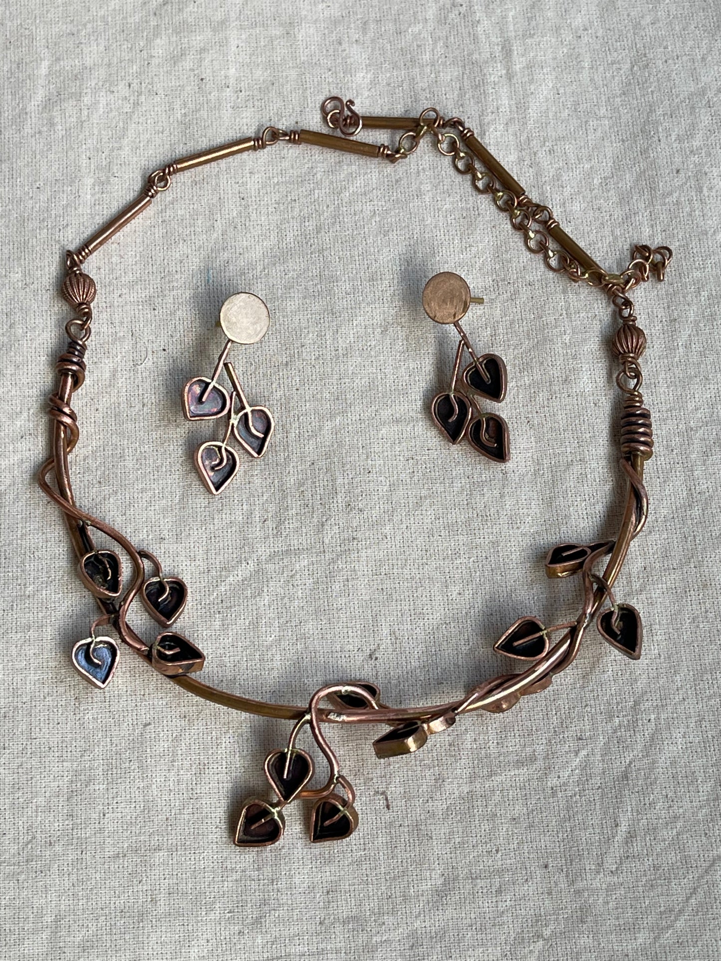 Small leaves on a climber copper handcrafted necklace and earrings set