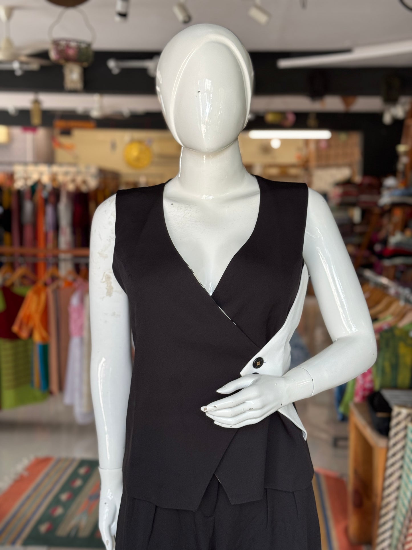Black and white women’s vest style top