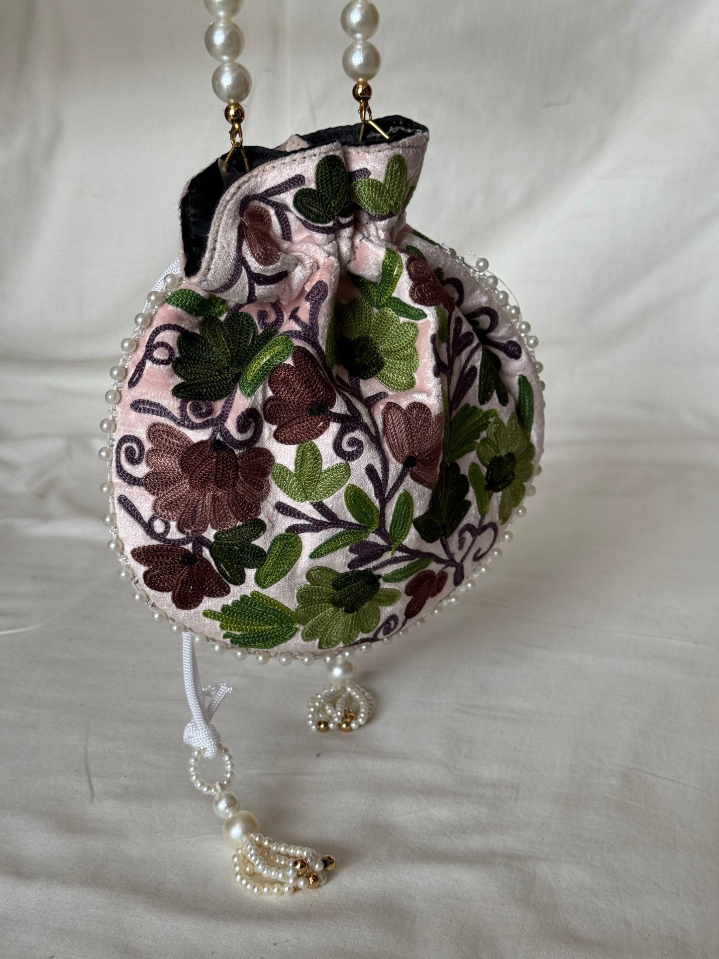 Round Potli bag with Kashmiri floral Aari embroidery - drawstring closure