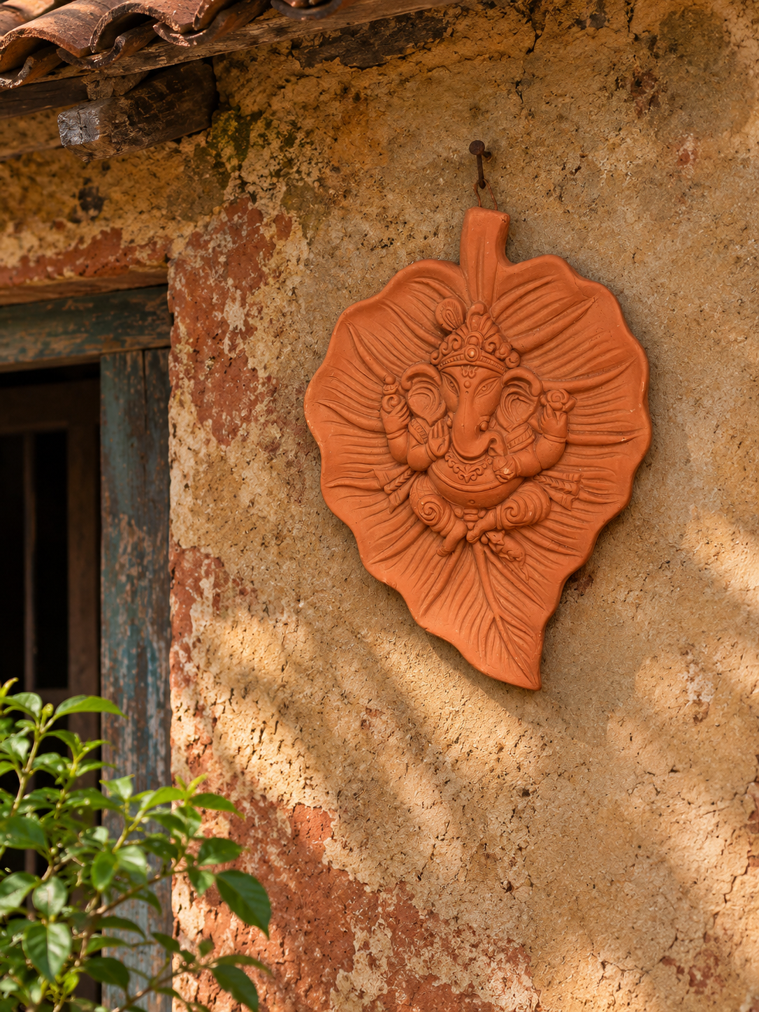 Ganesha on a leaf wall plate - handcrafted clay