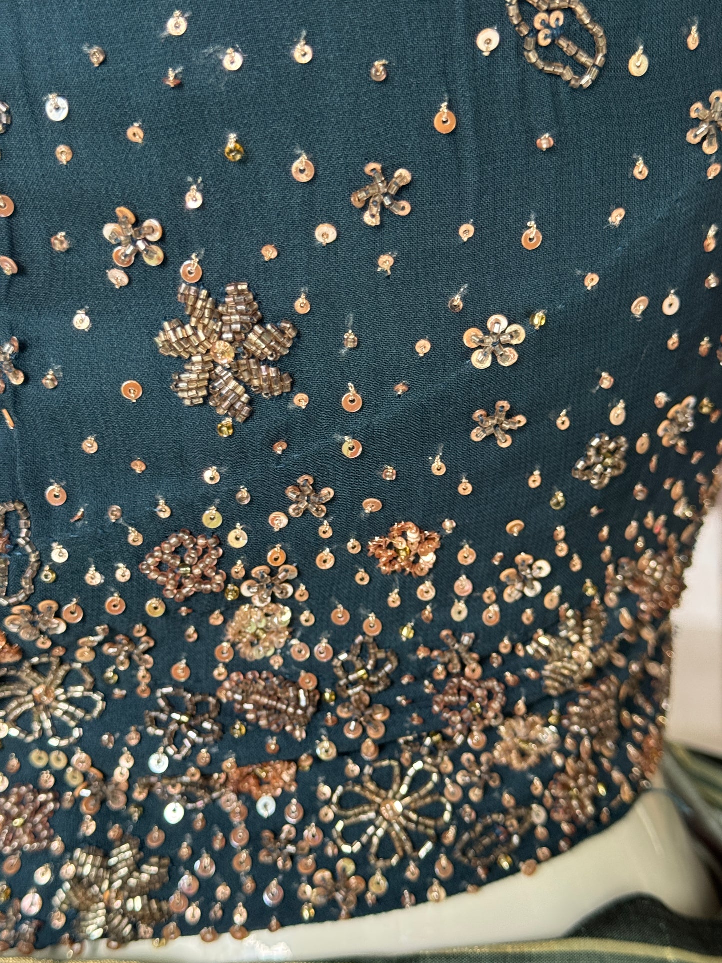 Teal hand embroidered georgette sleeveless blouse with work on front and back