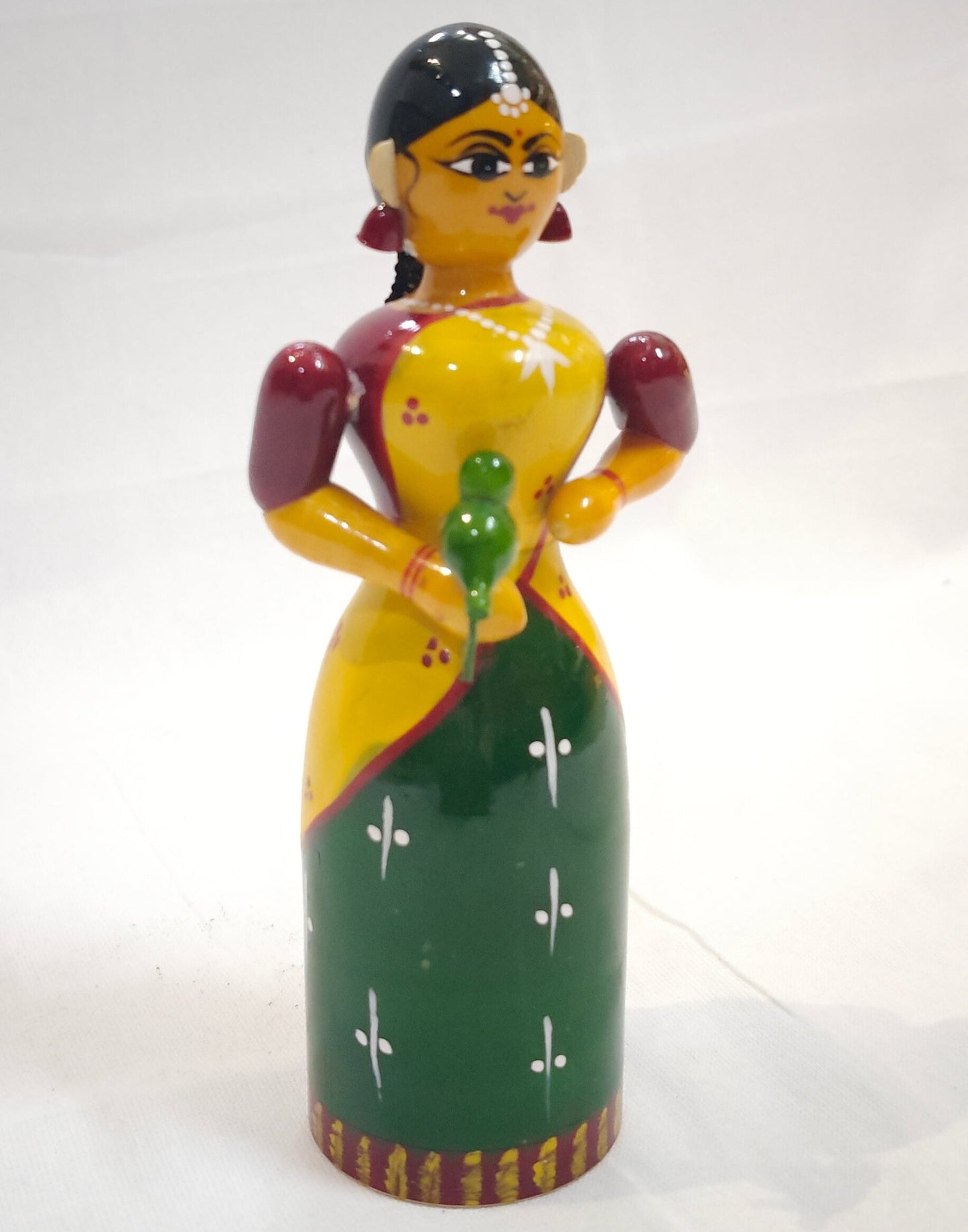 Lady in a half saree cherishing a parrot - Etikoppaka Wooden handcrafted  decor