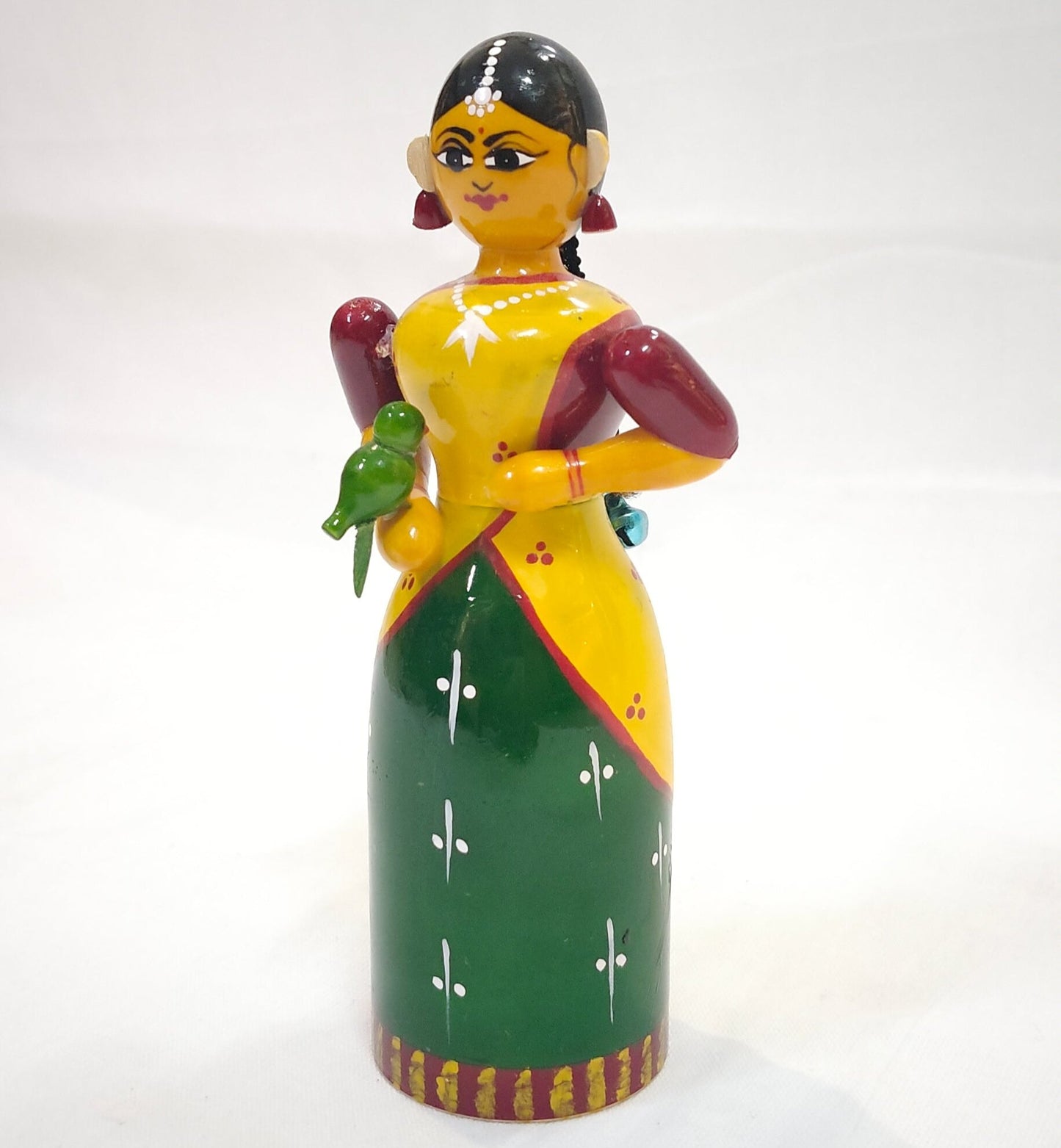 Lady in a half saree cherishing a parrot - Etikoppaka Wooden handcrafted  decor