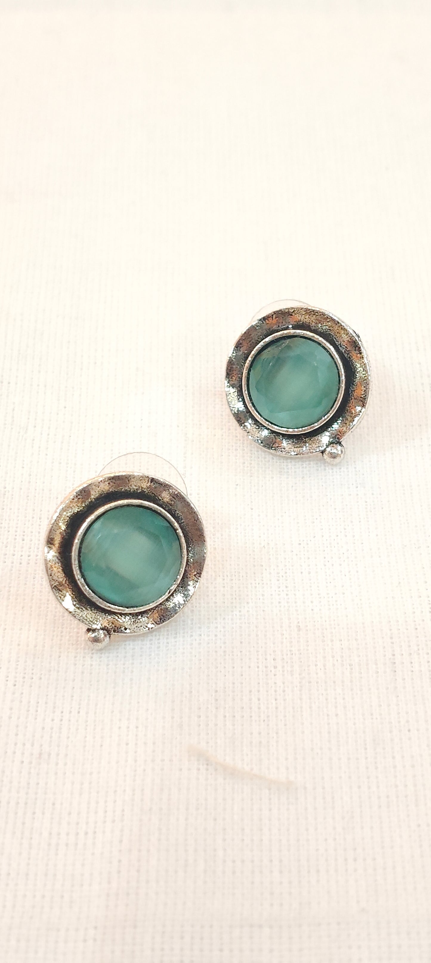 Mint green circular stone stud earrings