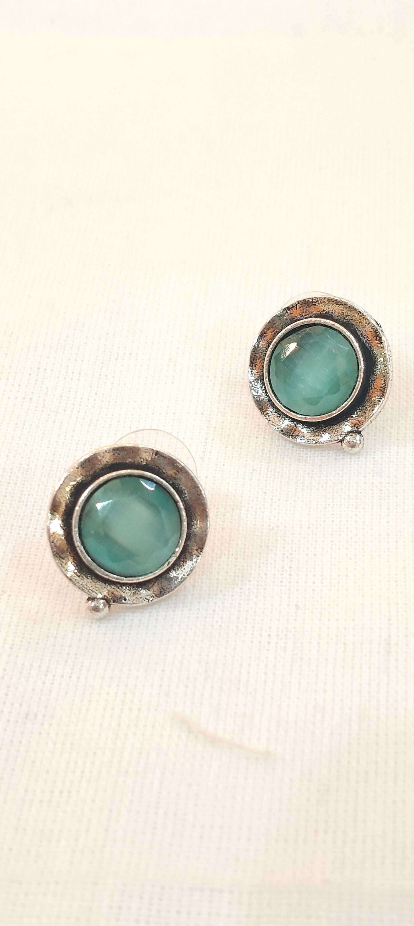 Mint green circular stone stud earrings