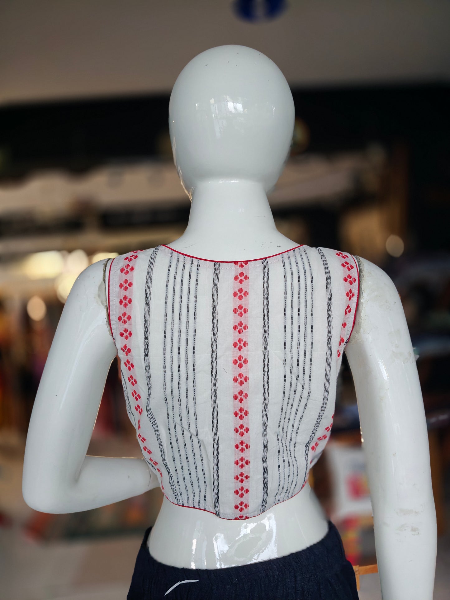 Off white stripes red dot prints front open sleeveless handwoven cotton blouse with pads