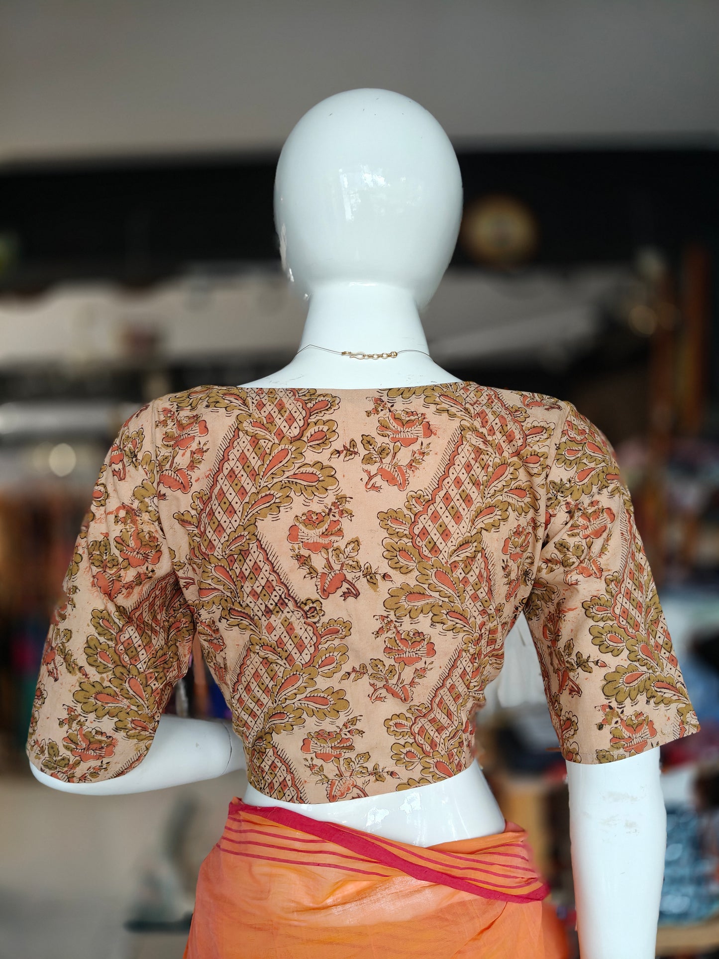 Zigzag peach olive green floral hand block printed Kalamkari cotton elbow sleeves front open V-neck blouse with flap collar