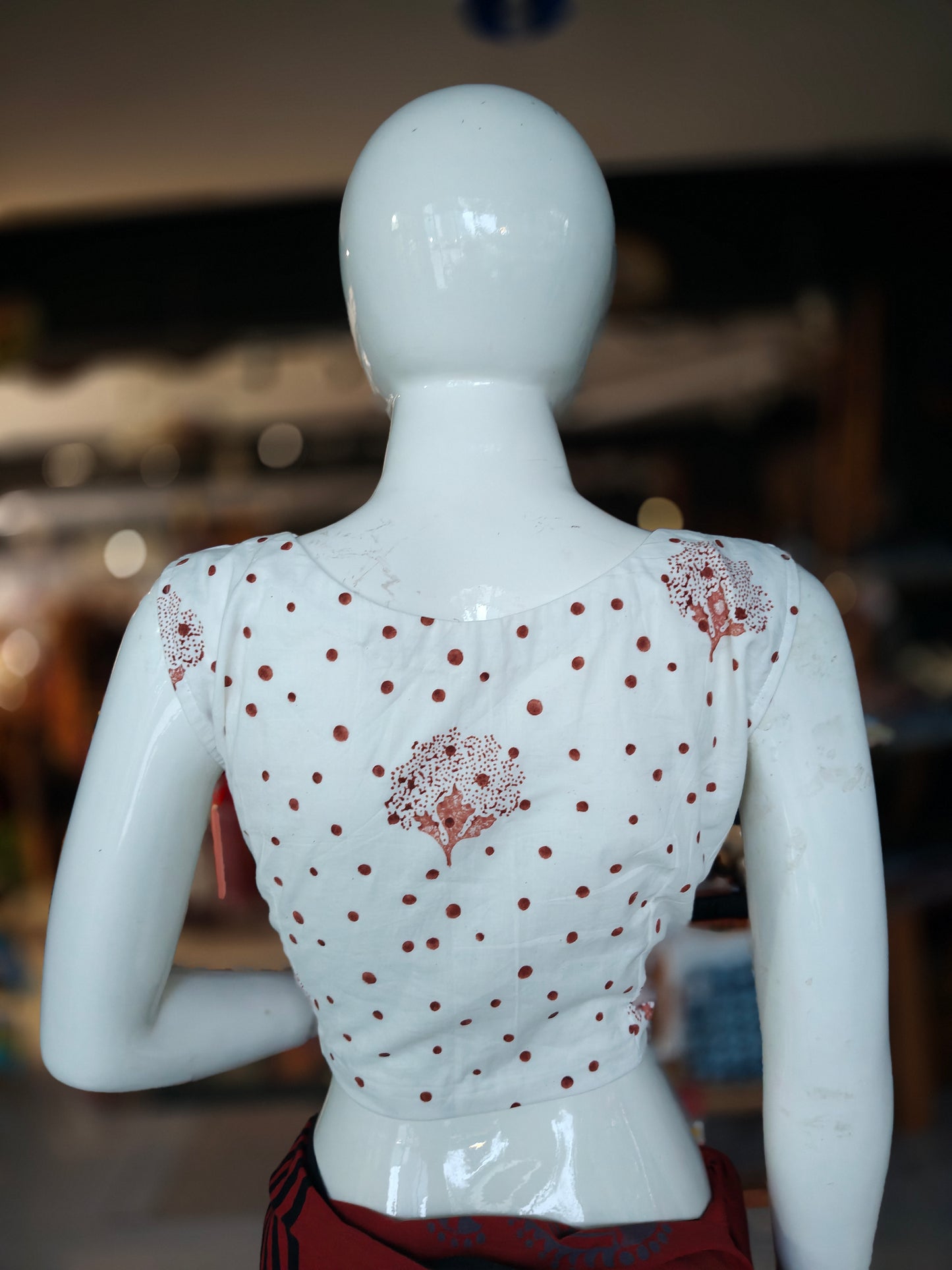 Off-white and brown polka dots hand block printed cotton sleeveless front open blouse