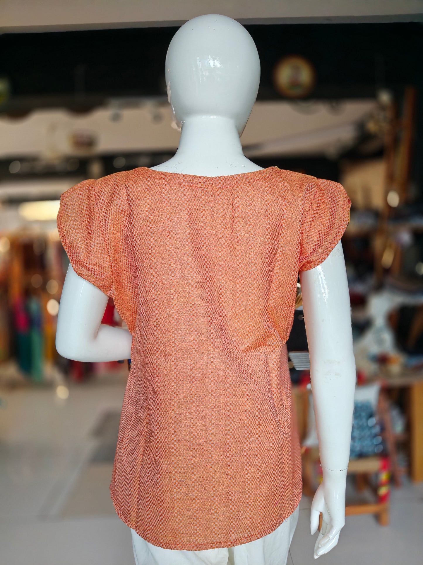 Orange textured handloom cotton top with fancy sleeves