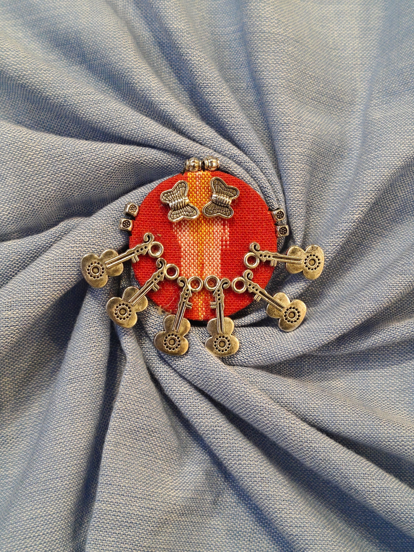 Elegant Ajrakh brooches with silver work - multiple colors and patterns