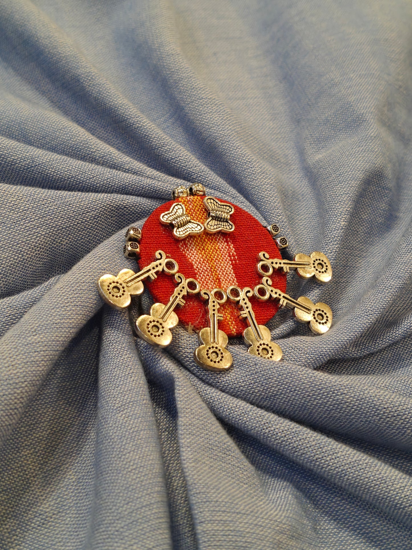 Elegant Ajrakh brooches with silver work - multiple colors and patterns