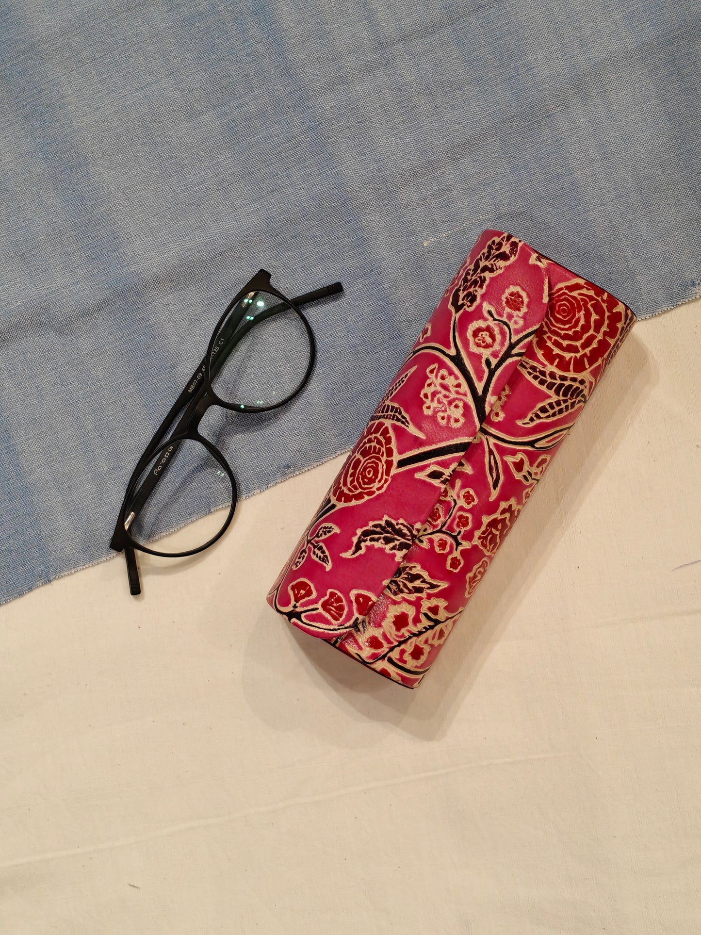 Hand embossed hand painted leather spectacles / goggles case