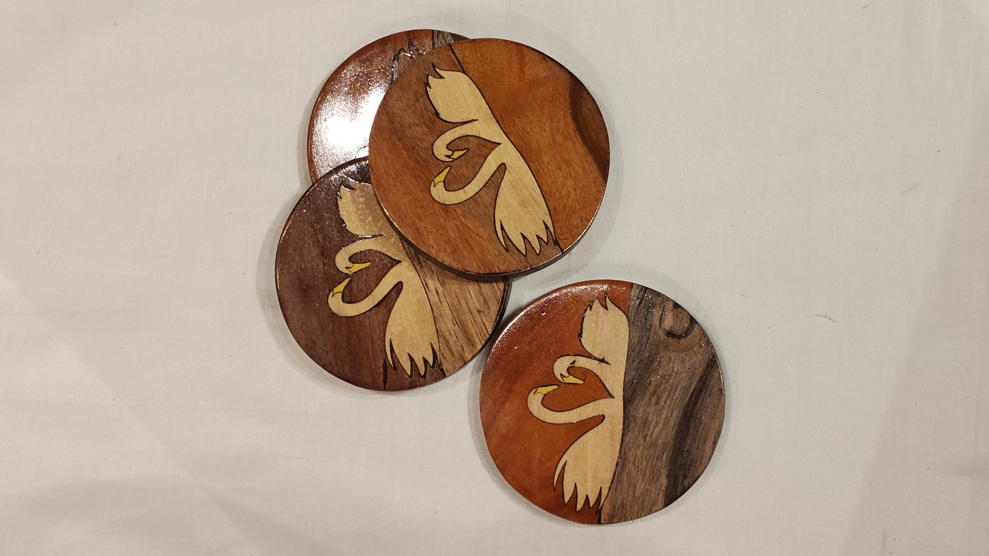 Handcrafted Wooden coaster with Swans design on it