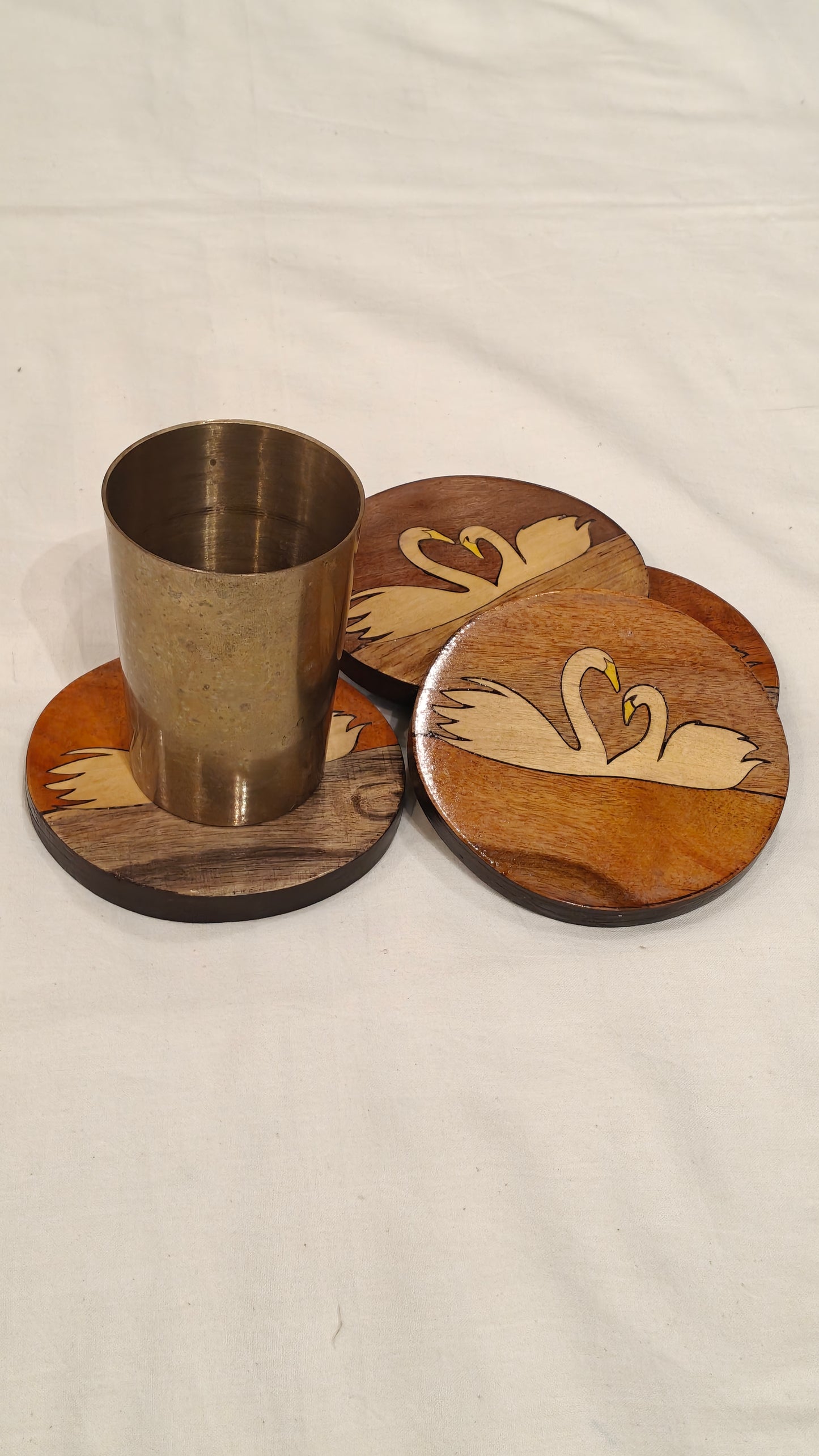 Handcrafted Wooden coaster with Swans design on it