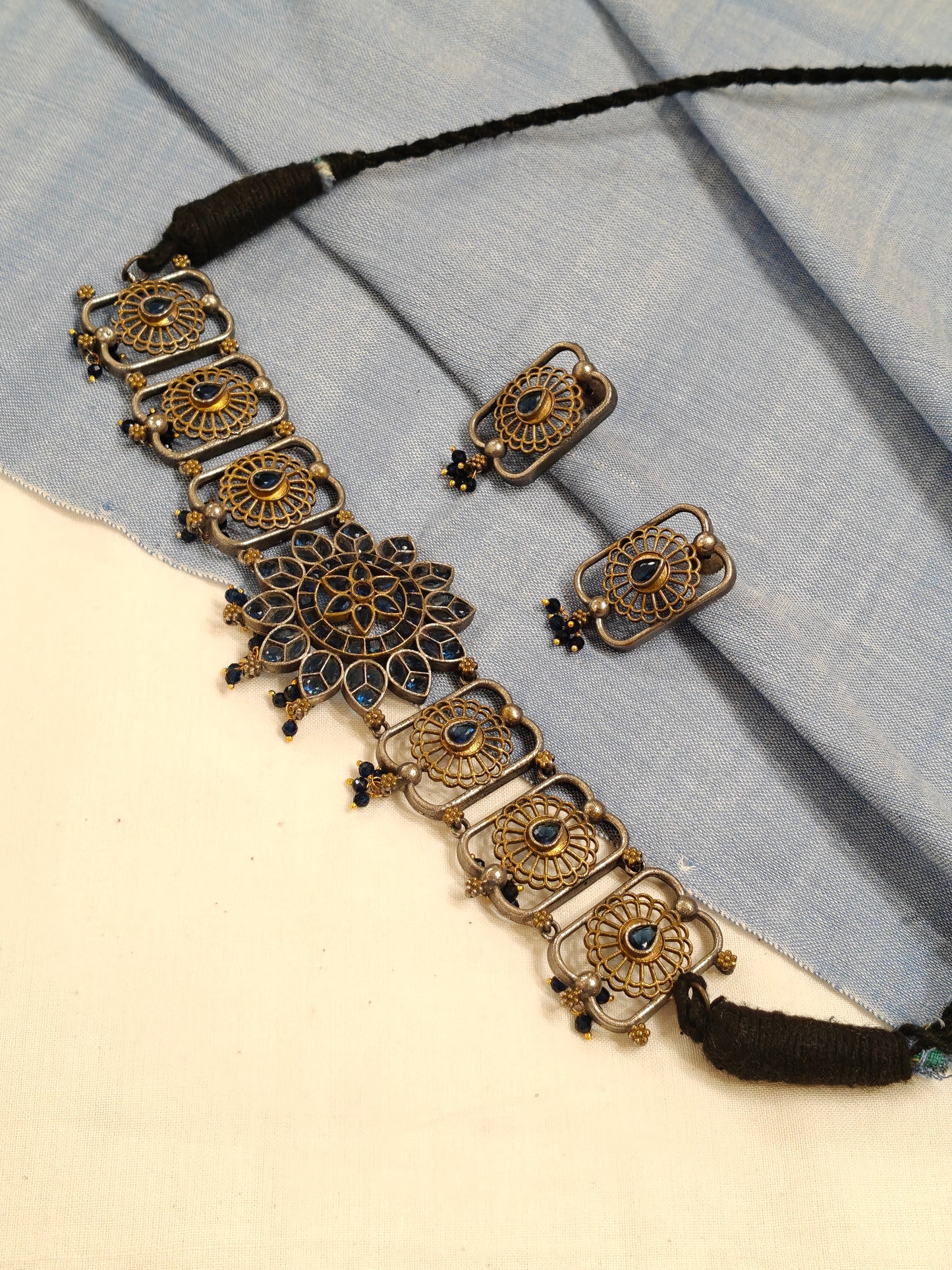Blue stones choker and earrings set in gold silver dual tone