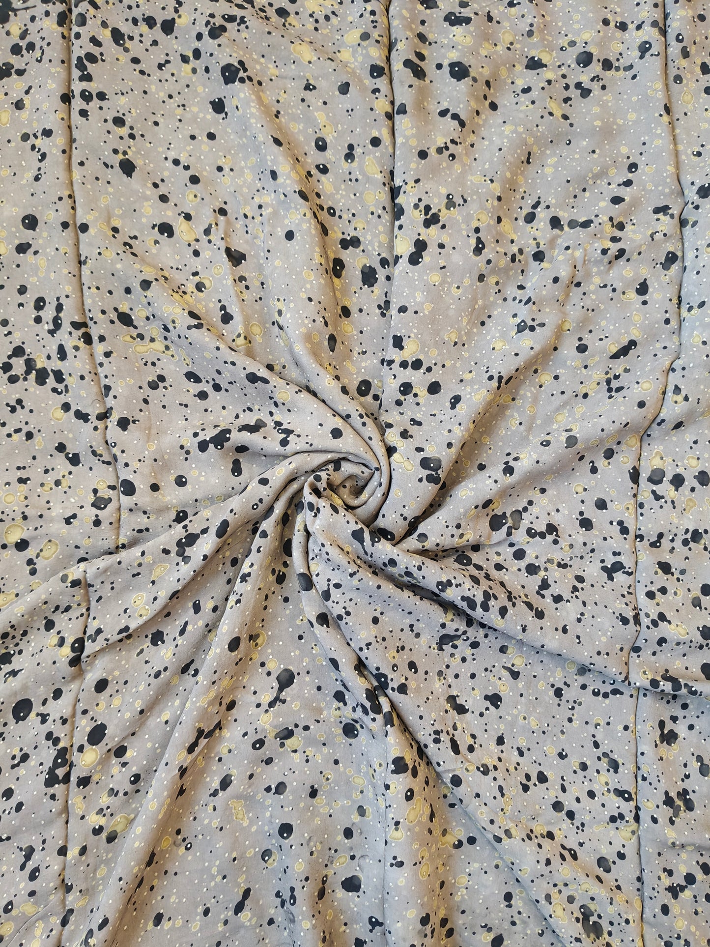 Greyish brown modal Ajrakh hand block print fabric with black and green splashes on it