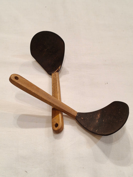 Serving spoon made of coconut shell with wooden handle